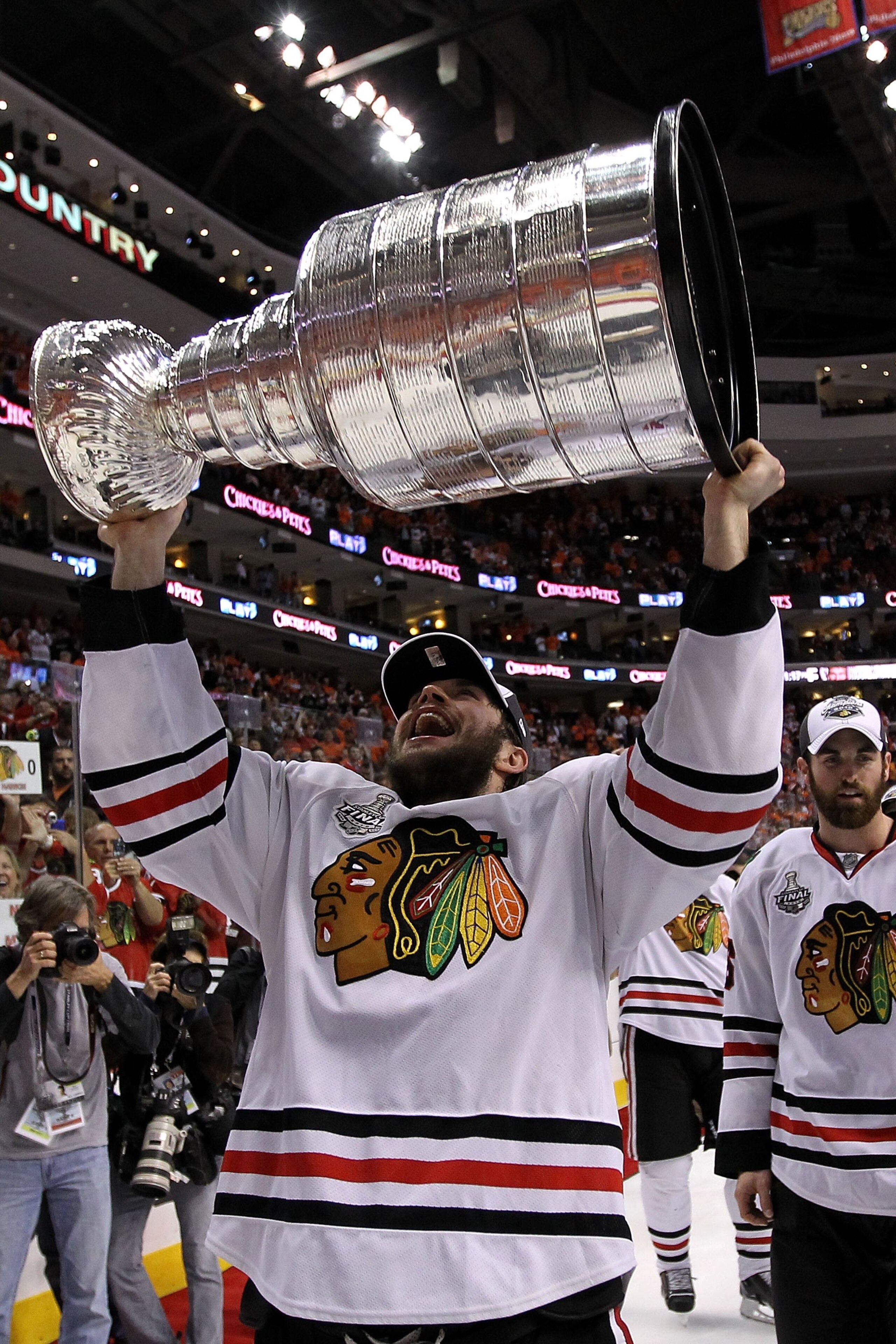 PHILADELPHIA - JUNE 09: Dave Bolland #36 of the Chicago Blackhawks hoists the Stanley Cup after teammate Patrick Kane #88 scored the game-winning goal in overtime to defeat the Philadelphia Flyers 4-3 and win the Stanley Cup in Game Six of the 2010 NHL S PHILADELPHIA - JUNE 09: Dave Bolland #36 of the Chicago Blackhawks hoists the Stanley Cup after teammate Patrick Kane #88 scored the game-winning goal in overtime to defeat the Philadelphia Flyers 4-3 and win the Stanley Cup in Game Six of the 2010 NHL S