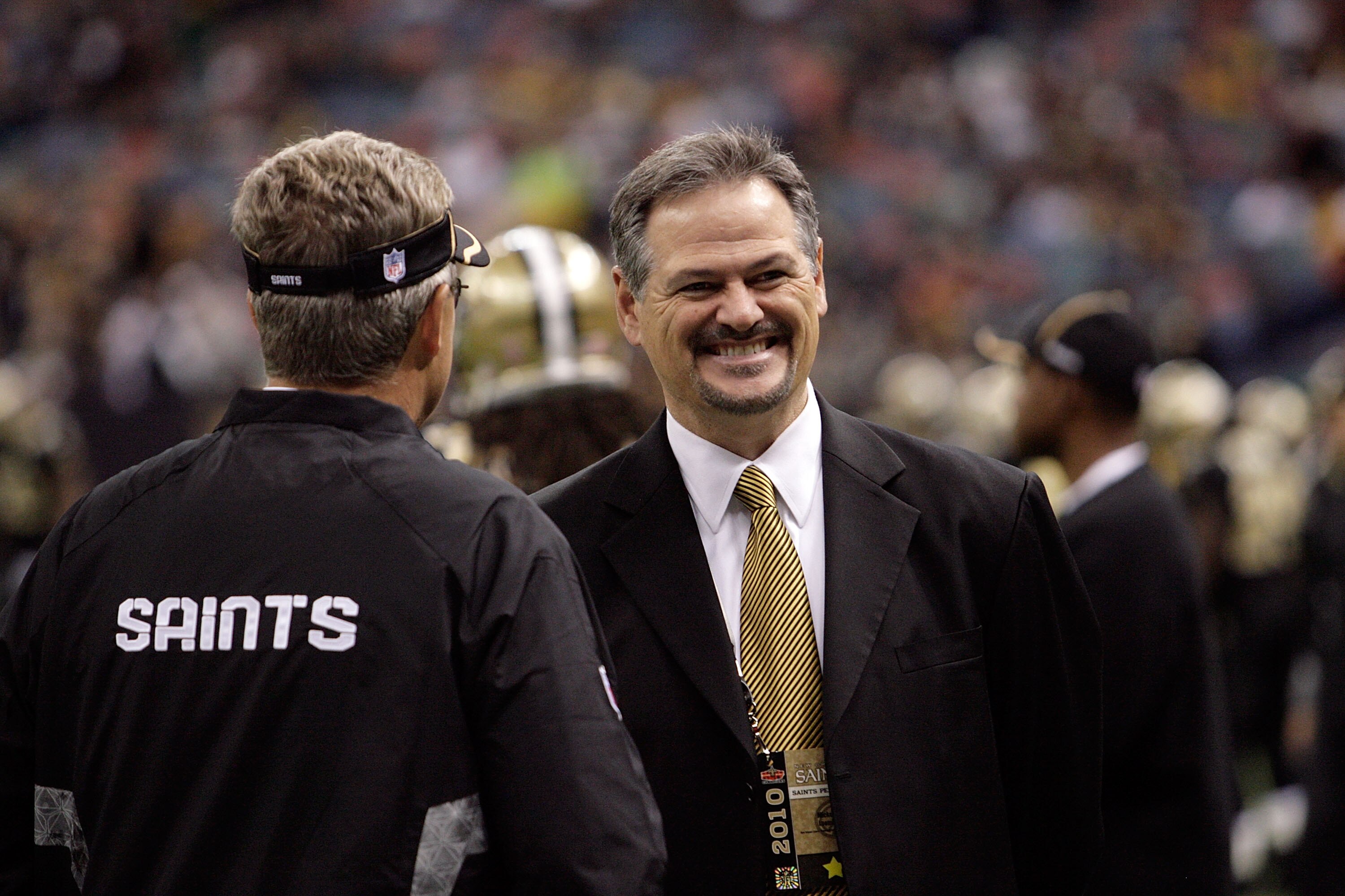 NEW ORLEANS, LA - OCTOBER 31: General manager Mickey Loomis of the New Orleans Saints talks to a coach prior to the game against the Pittsburgh Steelers at the Louisiana Superdome on October 31, 2010 in New Orleans, Louisiana. (Photo by Matthew Sharpe/Get