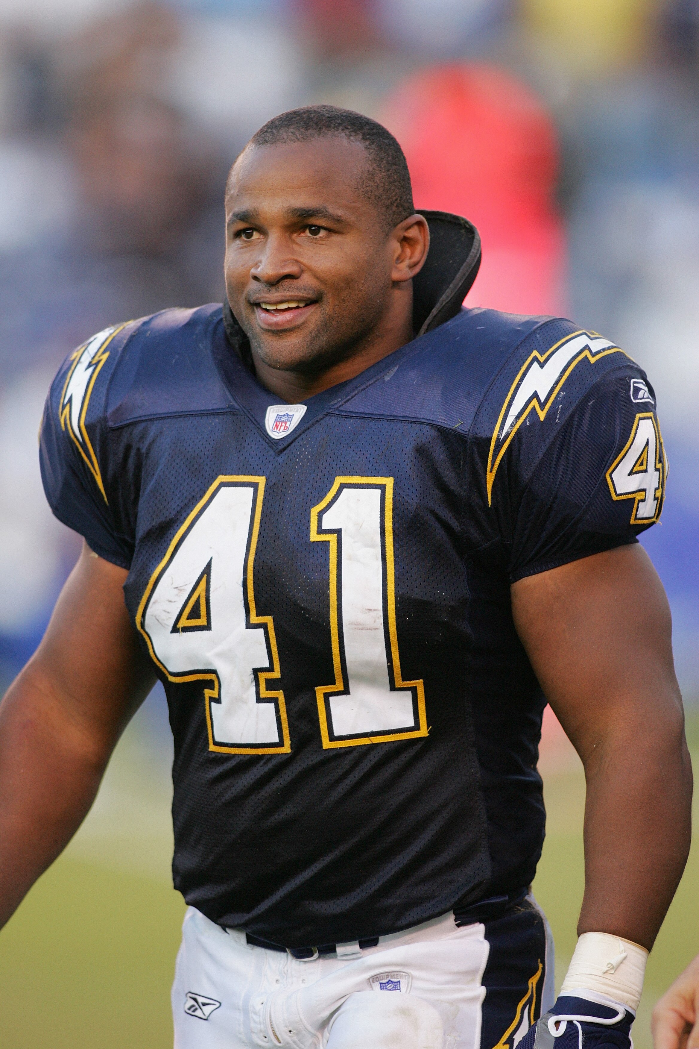 SAN DIEGO - OCTOBER 31:  Fullback Lorenzo Neal #41 of the San Diego Chargers walks on the field during the game against the Oakland Raiders at Qualcomm Stadium on October 31, 2004 in San Diego, California. The Chargers defeated the Raiders 42-14. (Photo b