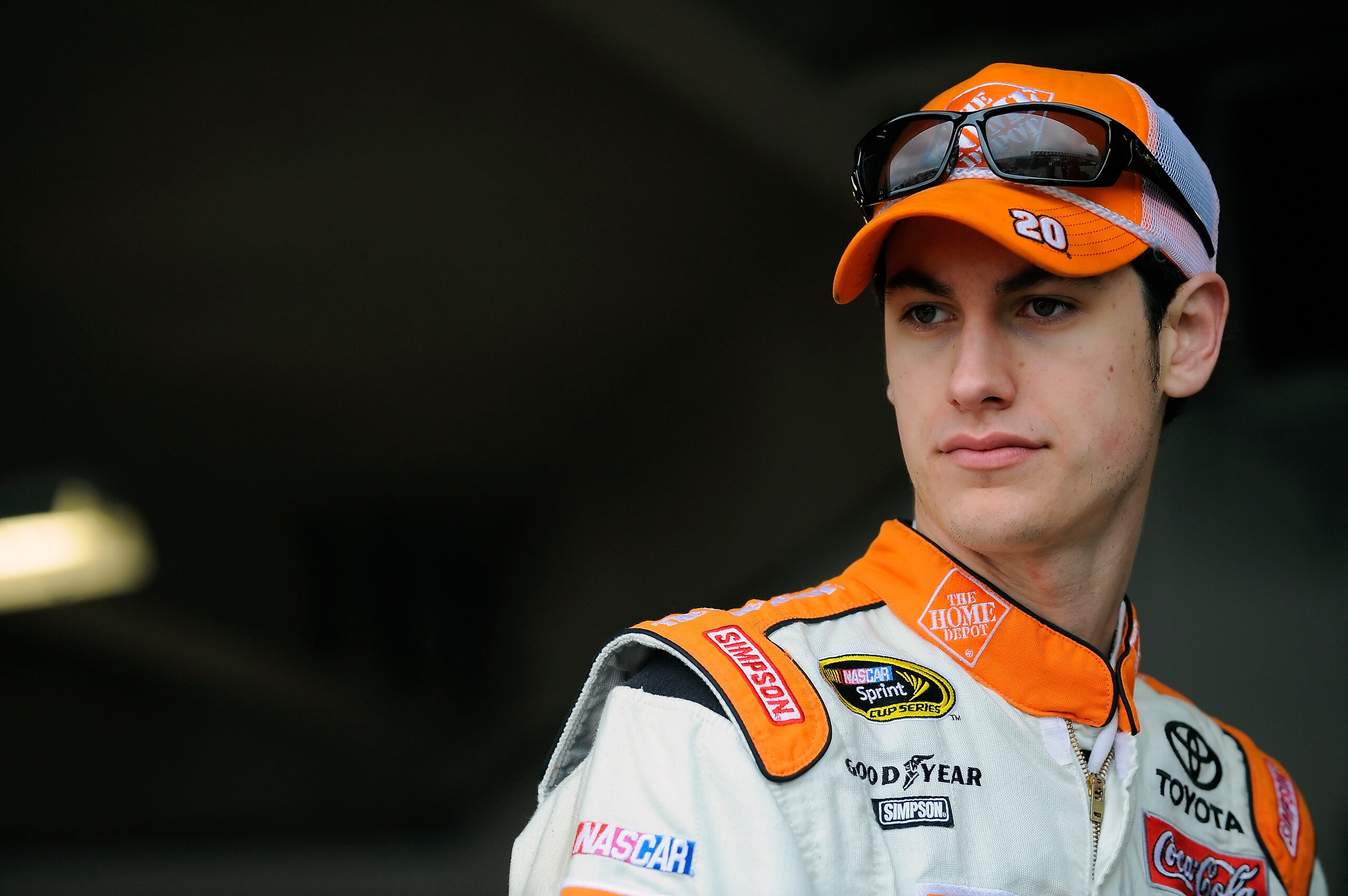 DAYTONA BEACH, FL - JANUARY 22: Joey Logano, driver of the #20 Home Depot Toyota, stands in the garage area during testing at Daytona International Speedway on January 22, 2011 in Daytona Beach, Florida. (Photo by Jared C. Tilton/Getty Images for NASCAR DAYTONA BEACH, FL - JANUARY 22: Joey Logano, driver of the #20 Home Depot Toyota, stands in the garage area during testing at Daytona International Speedway on January 22, 2011 in Daytona Beach, Florida. (Photo by Jared C. Tilton/Getty Images for NASCAR