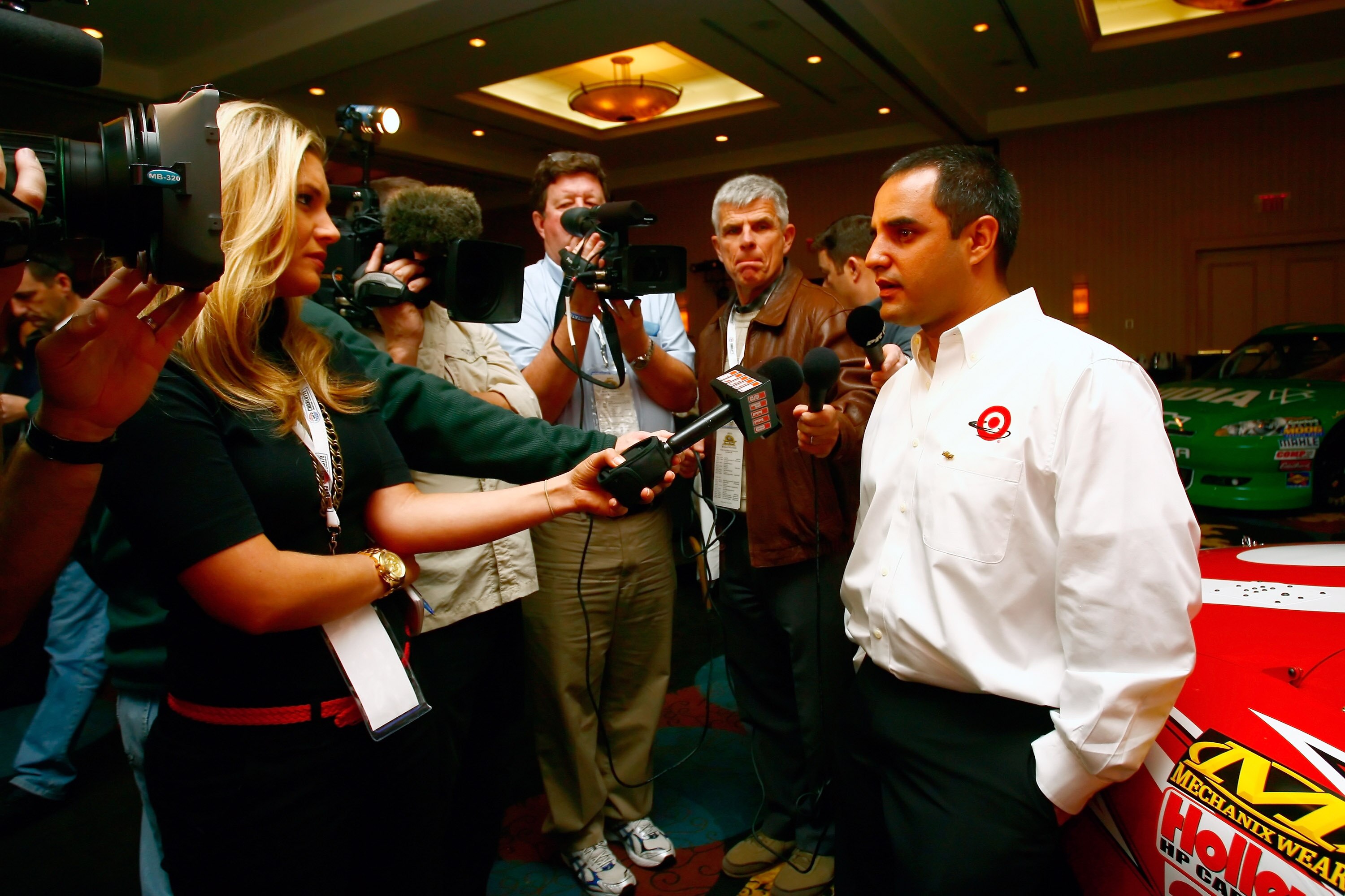 CHARLOTTE, NC - JANUARY 24: Juan Pablo Montoya, driver of the #42 Target Chevrolet, speaks with the media during the NASCAR Sprint Media Tour hosted by Charlotte Motor Speedway, held at Hilton University on January 24, 2011 in Charlotte, North Carolina. (