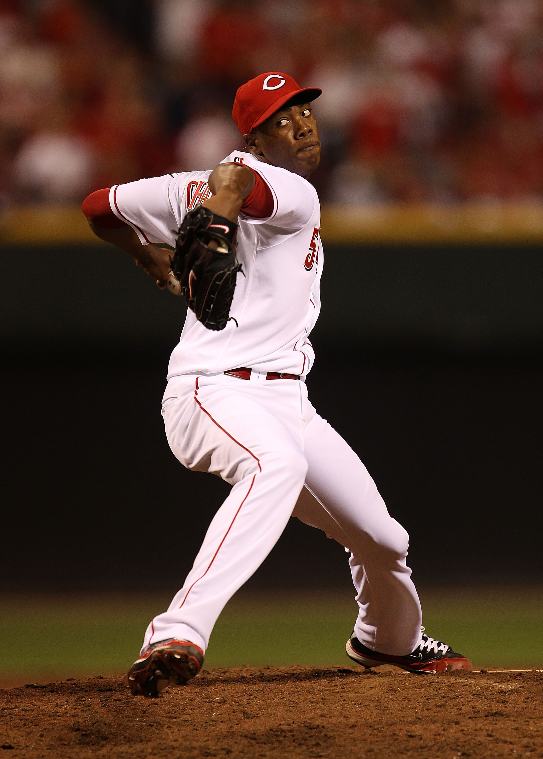 CINCINNATI - OCTOBER 10: Aroldis Chapman #54 of the Cincinnati Reds pitches in the 9th inning against the Philadelphia Phillies during game 3 of the NLDS at Great American Ball Park on October 10, 2010 in Cincinnati, Ohio. The Phillies defeated the Reds 2