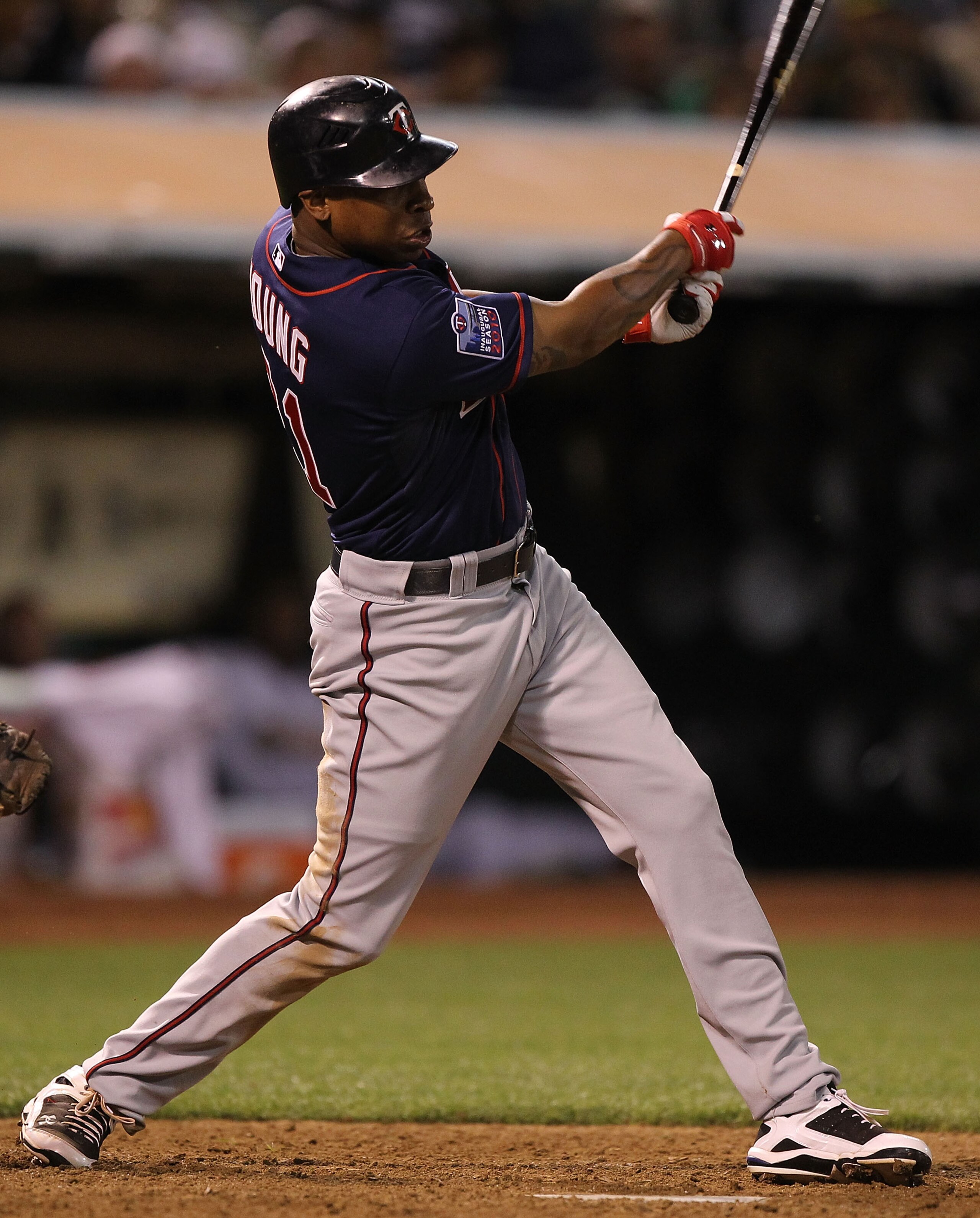 OAKLAND, CA - JUNE 4: Delmon Young #21 of the Minnesota Twins hits an RBI single in the eleventh inning against the Oakland Athletics during an MLB game at the Oakland-Alameda County Coliseum on June 4, 2010 in Oakland, California. (Photo by Jed Jacobsohn OAKLAND, CA - JUNE 4: Delmon Young #21 of the Minnesota Twins hits an RBI single in the eleventh inning against the Oakland Athletics during an MLB game at the Oakland-Alameda County Coliseum on June 4, 2010 in Oakland, California. (Photo by Jed Jacobsohn