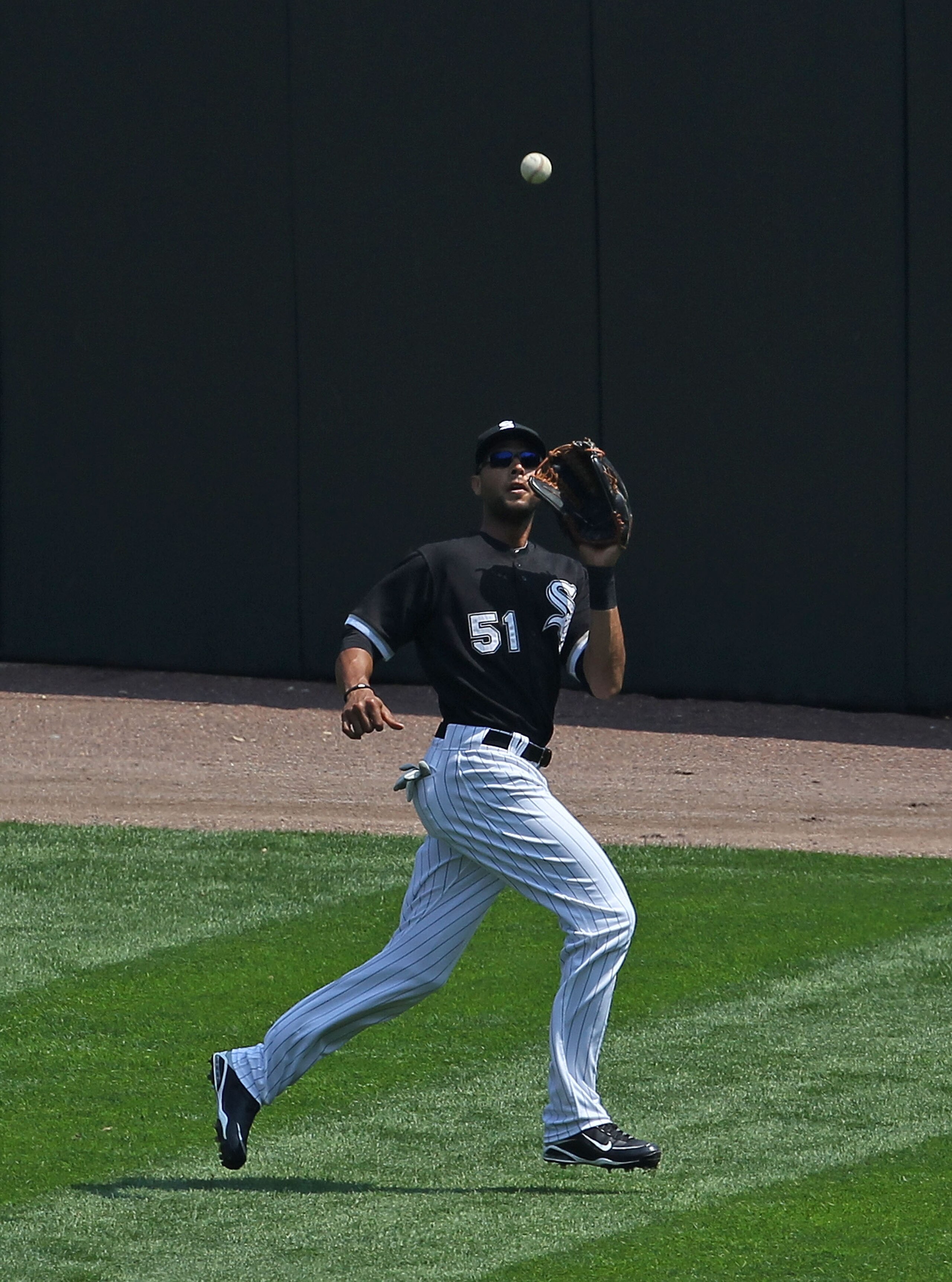 CHICAGO - AUGUST 01: Alex Rios #51 of the Chicago White Sox makes a catch against the Oakland Athletics at U.S. Cellular Field on August 1, 2010 in Chicago, Illinois. The White Sox defeated the Athletics 4-1. (Photo by Jonathan Daniel/Getty Images) CHICAGO - AUGUST 01: Alex Rios #51 of the Chicago White Sox makes a catch against the Oakland Athletics at U.S. Cellular Field on August 1, 2010 in Chicago, Illinois. The White Sox defeated the Athletics 4-1. (Photo by Jonathan Daniel/Getty Images)