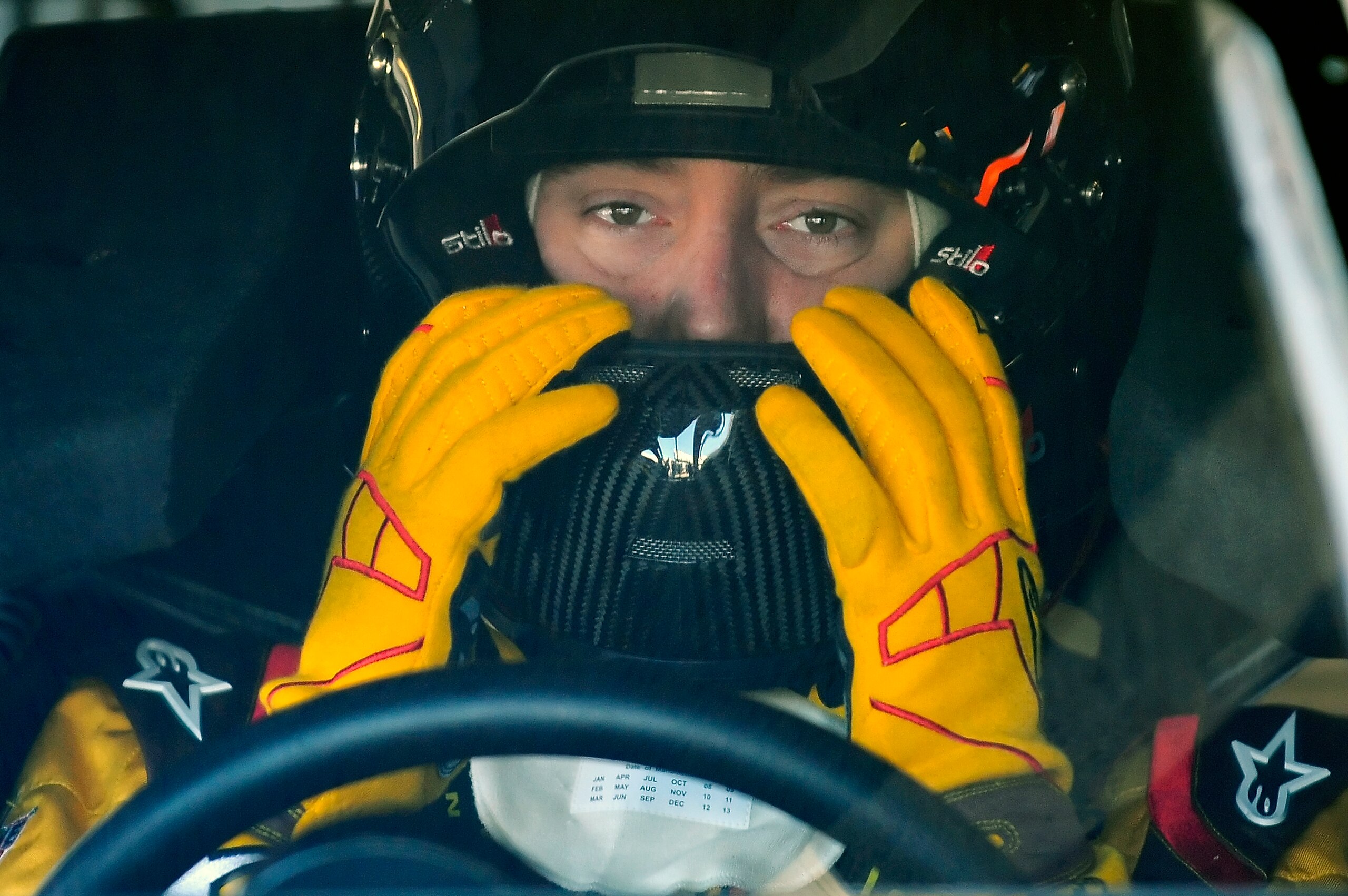 DAYTONA BEACH, FL - JANUARY 22: Kyle Busch, driver of the #18 M&M's Toyota, adjusts his helmet prior to testing at Daytona International Speedway on January 22, 2011 in Daytona Beach, Florida. (Photo by Jared C. Tilton/Getty Images for NASCAR) DAYTONA BEACH, FL - JANUARY 22: Kyle Busch, driver of the #18 M&M's Toyota, adjusts his helmet prior to testing at Daytona International Speedway on January 22, 2011 in Daytona Beach, Florida. (Photo by Jared C. Tilton/Getty Images for NASCAR)