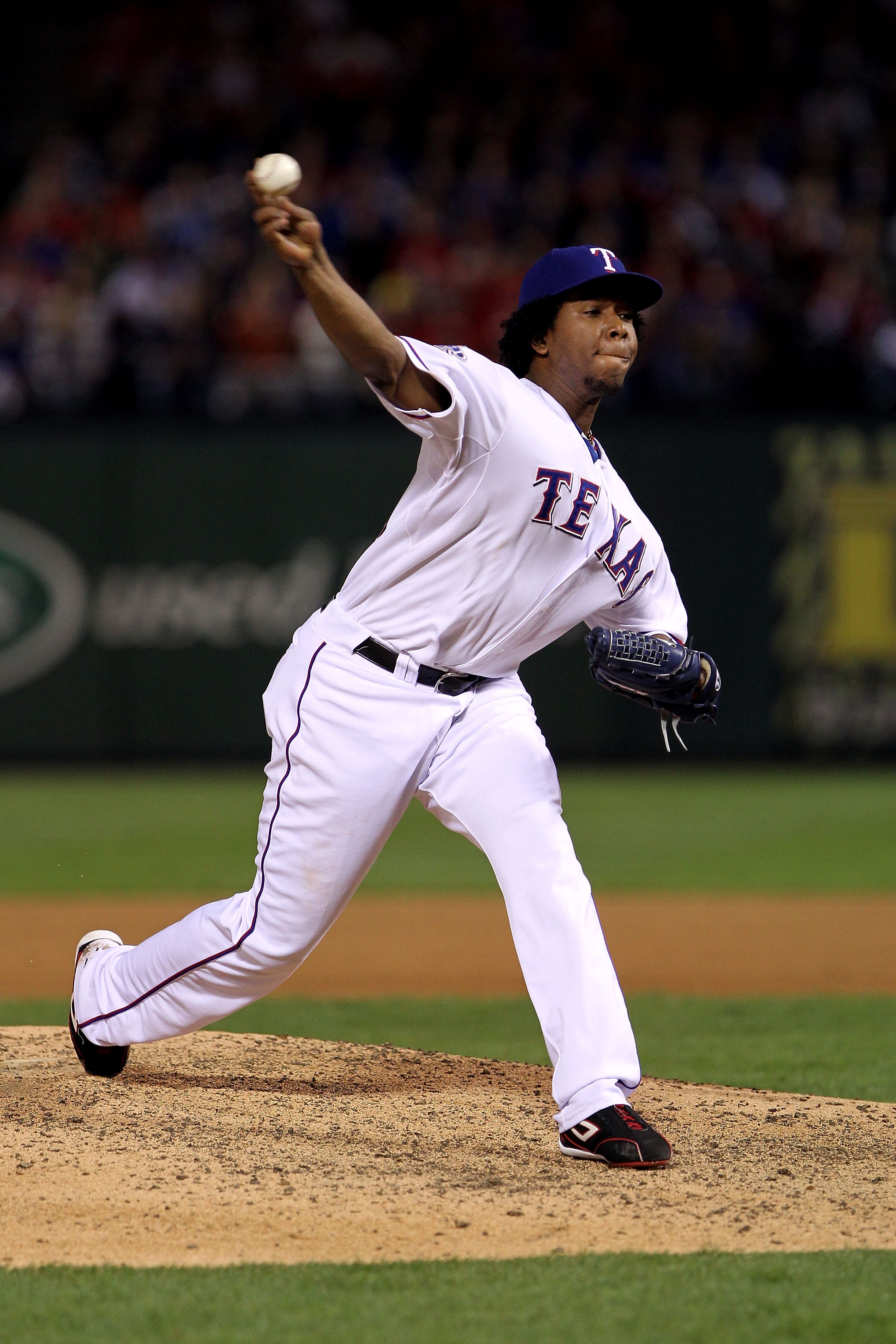 ARLINGTON, TX - NOVEMBER 01:  Neftali Feliz #30 of the Texas Rangers pitches against the San Francisco Giants in Game Five of the 2010 MLB World Series at Rangers Ballpark in Arlington on November 1, 2010 in Arlington, Texas. The Giants won 3-1.  (Photo b