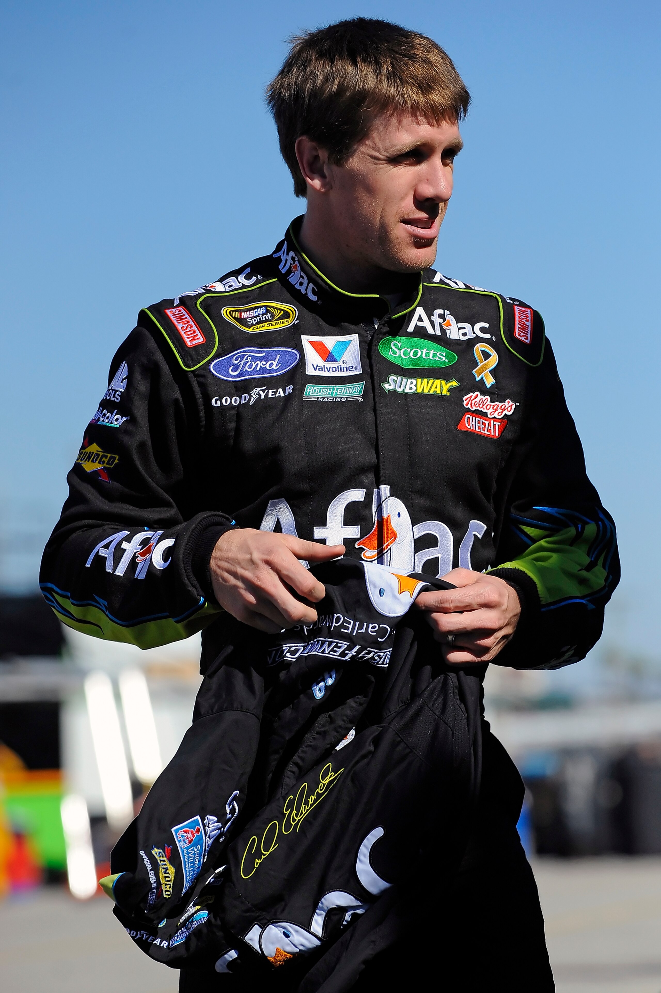 DAYTONA BEACH, FL - JANUARY 22: Carl Edwards, driver of the #99 Aflac Ford, walks through the garage area during practice at Daytona International Speedway on January 22, 2011 in Daytona Beach, Florida. (Photo by Jared C. Tilton/Getty Images for NASCAR) DAYTONA BEACH, FL - JANUARY 22: Carl Edwards, driver of the #99 Aflac Ford, walks through the garage area during practice at Daytona International Speedway on January 22, 2011 in Daytona Beach, Florida. (Photo by Jared C. Tilton/Getty Images for NASCAR)
