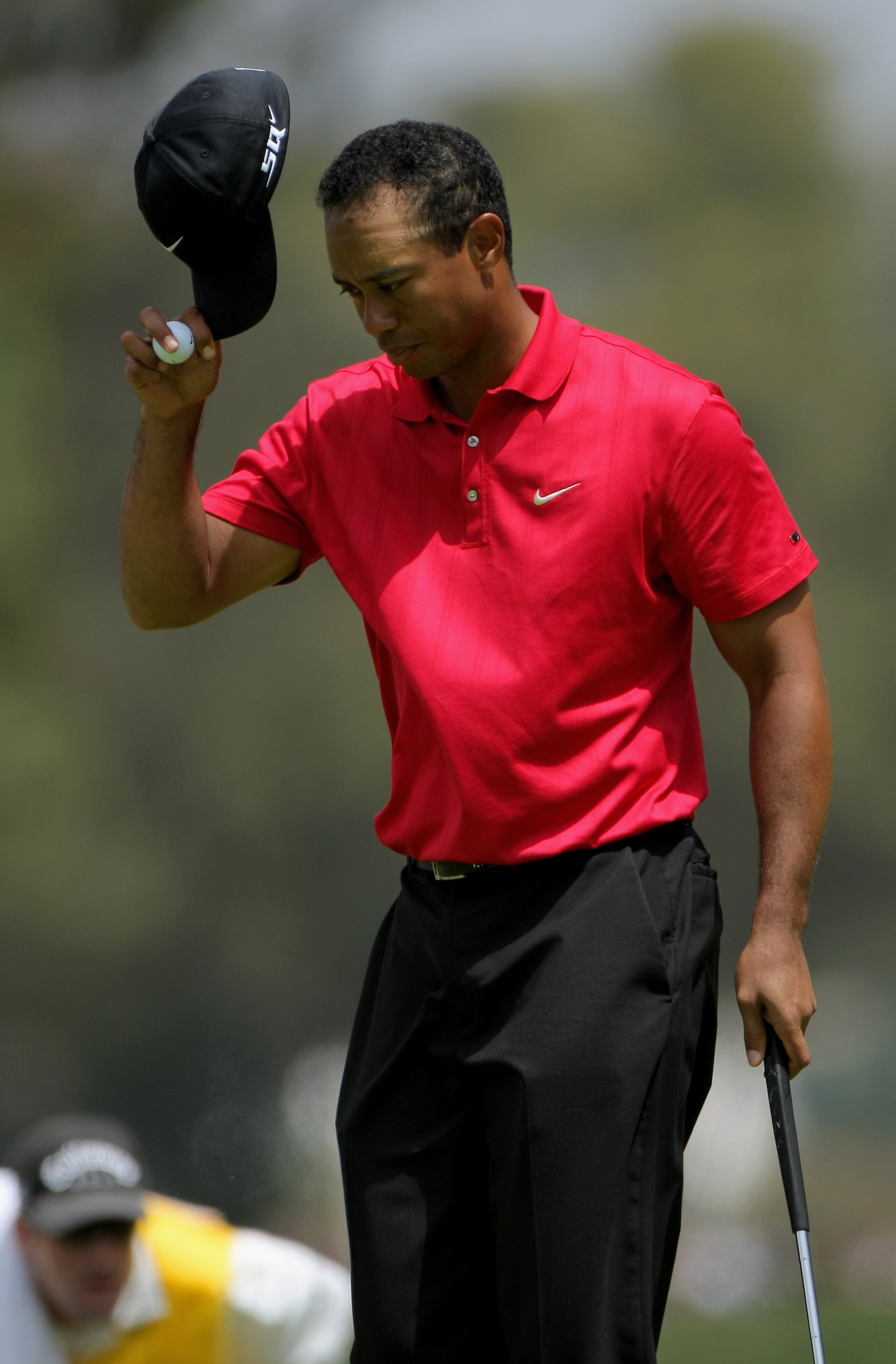 SAN DIEGO - JUNE 16:  Tiger Woods tips his cap to the applauds of the gallery after saving par on the 10th hole during the playoff round of the 108th U.S. Open at the Torrey Pines Golf Course (South Course) on June 16, 2008 in San Diego, California.  (Pho