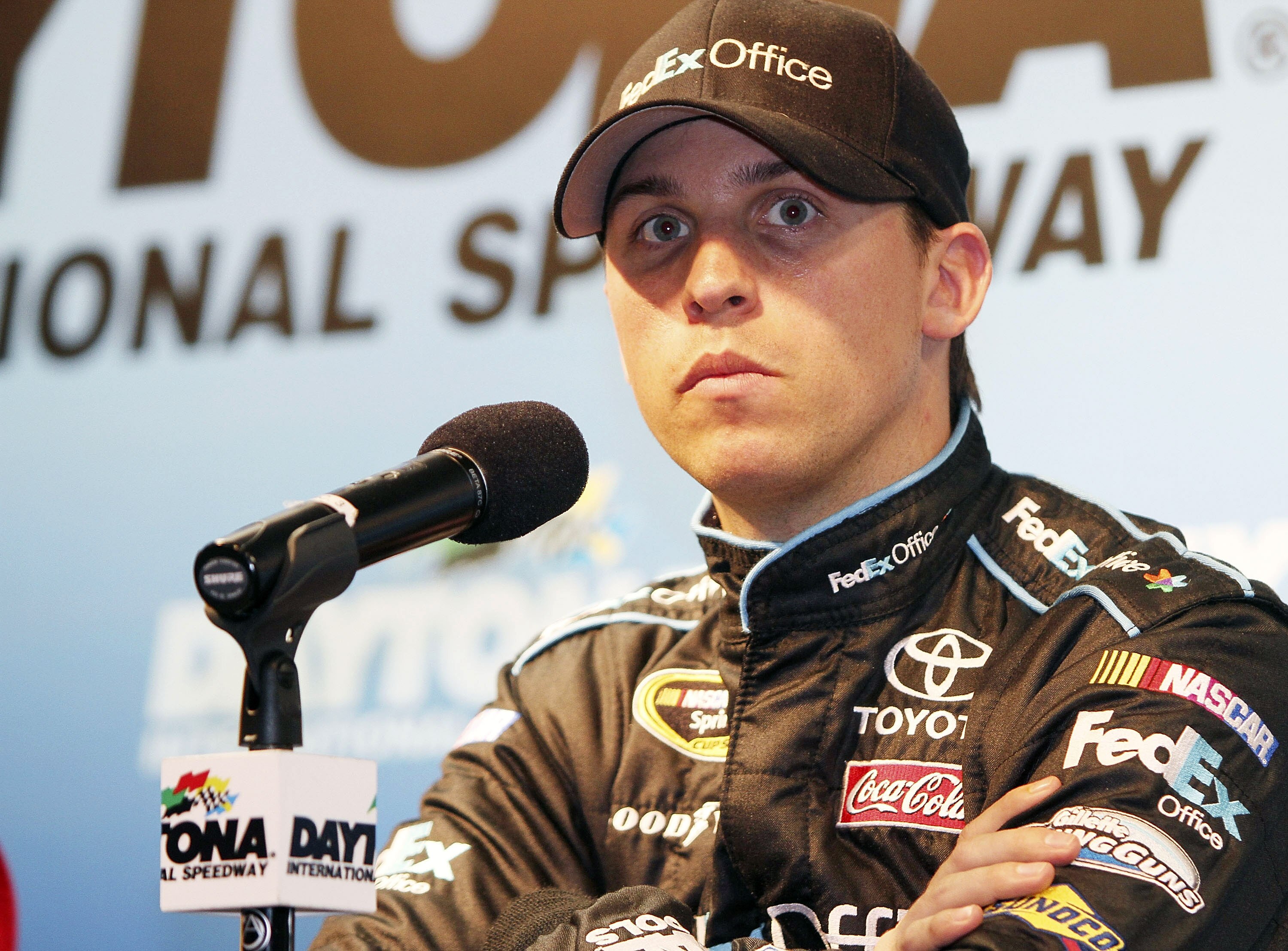 DAYTONA BEACH, FL - JANUARY 20:  Denny Hamlin, driver of the #11 FedEx Toyota addreses the media during testing at Daytona International Speedway on January 20, 2011 in Daytona Beach, Florida.  (Photo by Jerry Markland/Getty Images for NASCAR)