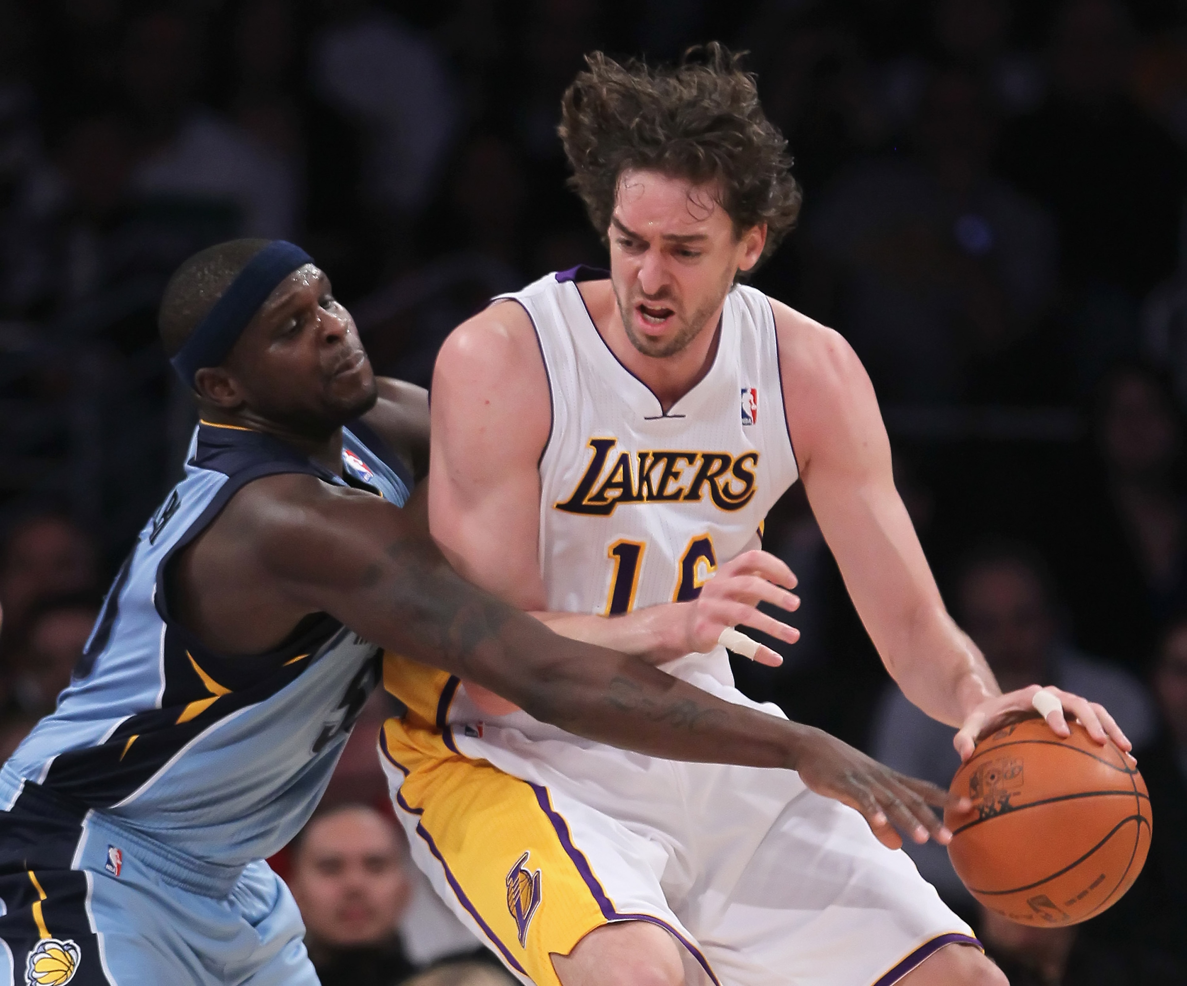 LOS ANGELES, CA - JANUARY 02:  Zach Randolph #50 of the Memphis Grizzlies attempts to steal the ball away from Pau Gasol #16 of the Los Angeles Lakers during the first half at Staples Center on January 2, 2011 in Los Angeles, California. The Grizzlies def