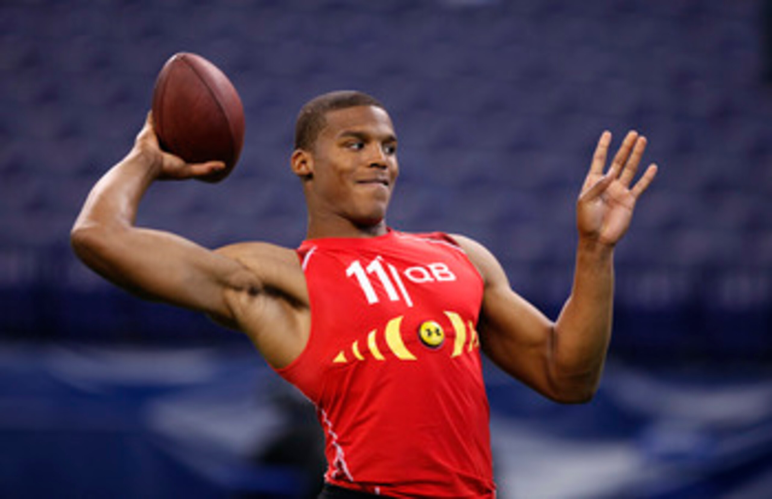 INDIANAPOLIS, IN - FEBRUARY 27: Cam Newton passes the ball during the 2011 NFL Scouting Combine at Lucas Oil Stadium on February 27, 2011 in Indianapolis, Indiana. (Photo by Joe Robbins/Getty Images)