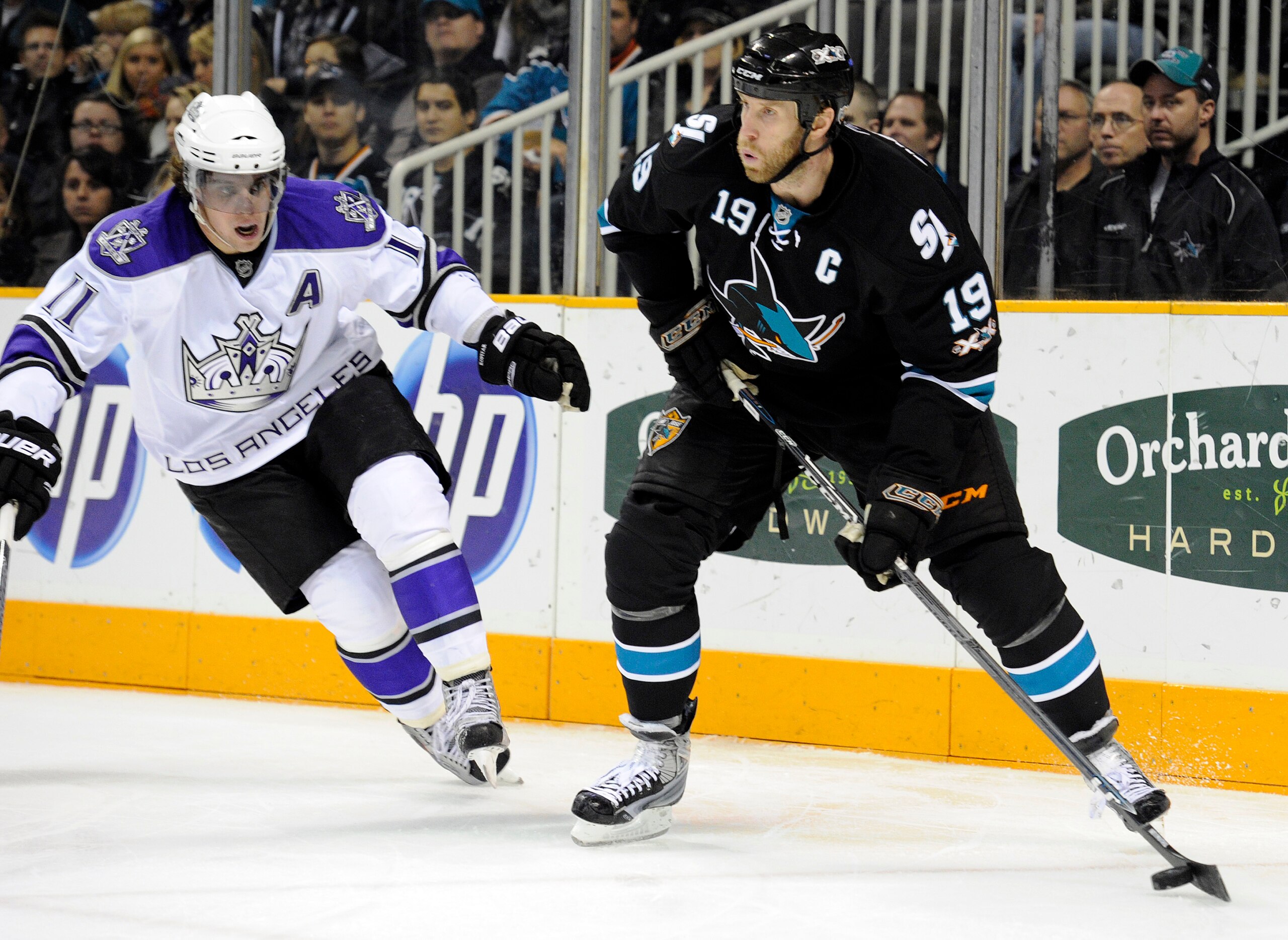 SAN JOSE, CA - DECEMBER 27:  Joe Thornton #19 of the San Jose Sharks controls the puck in front of Anze Kopitar #11 of the Los Angeles Kings during an NHL hockey game at the HP Pavilion on December 27, 2010 in San Jose, California. (Photo by Thearon W. He