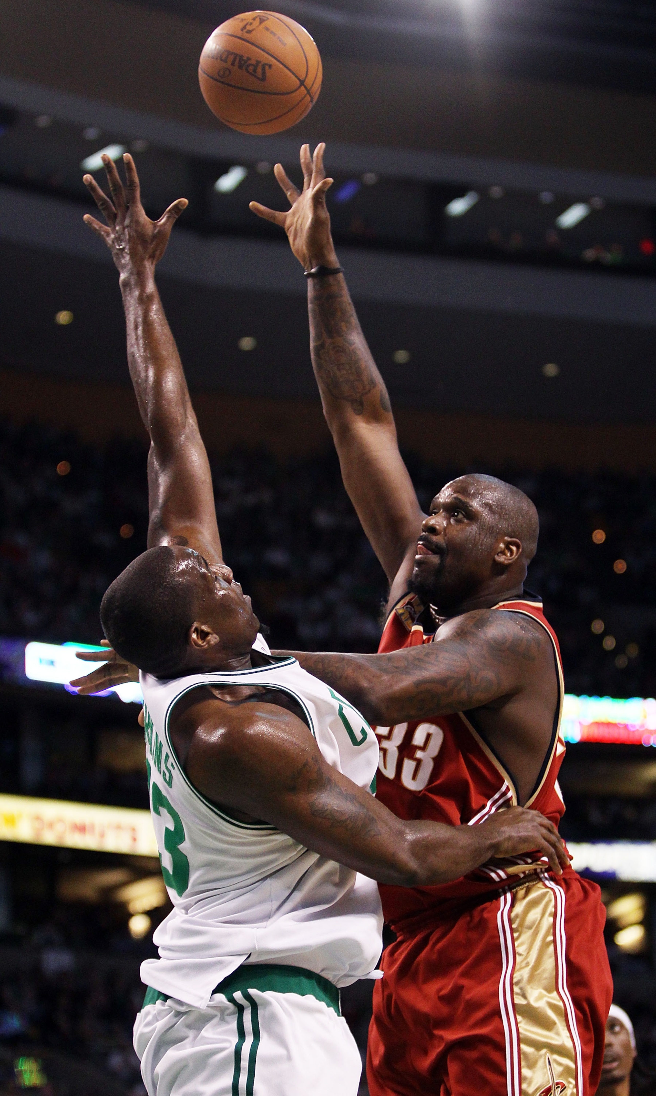 BOSTON - FEBRUARY 25:  Shaquille O'Neal #33 of the Cleveland Cavaliers takes a shot over Kendrick Perkins #43 of the Boston Celtics in the first quarter at the TD Garden on February 25, 2010 in Boston, Massachusetts.  NOTE TO USER: User expressly acknowle