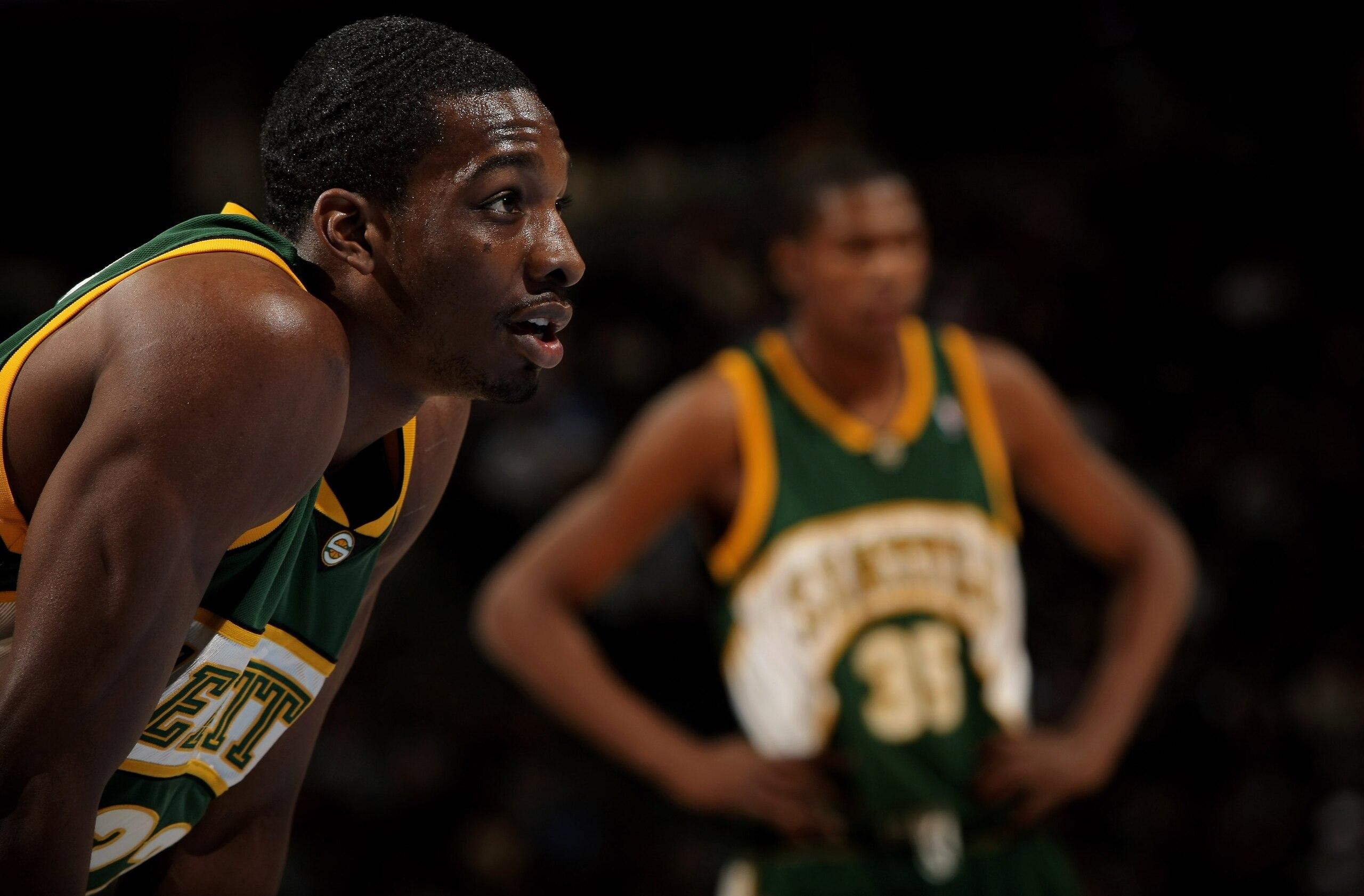 DENVER - MARCH 16: Jeff Green #22 and Kevin Durant #35 of the Seattle SuperSonics await action against the Denver Nuggets at the Pepsi Center on March 16, 2008 in Denver, Colorado. The Nuggets defeated the Sonics 168-116. NOTE TO USER: User expressly ack DENVER - MARCH 16: Jeff Green #22 and Kevin Durant #35 of the Seattle SuperSonics await action against the Denver Nuggets at the Pepsi Center on March 16, 2008 in Denver, Colorado. The Nuggets defeated the Sonics 168-116. NOTE TO USER: User expressly ack