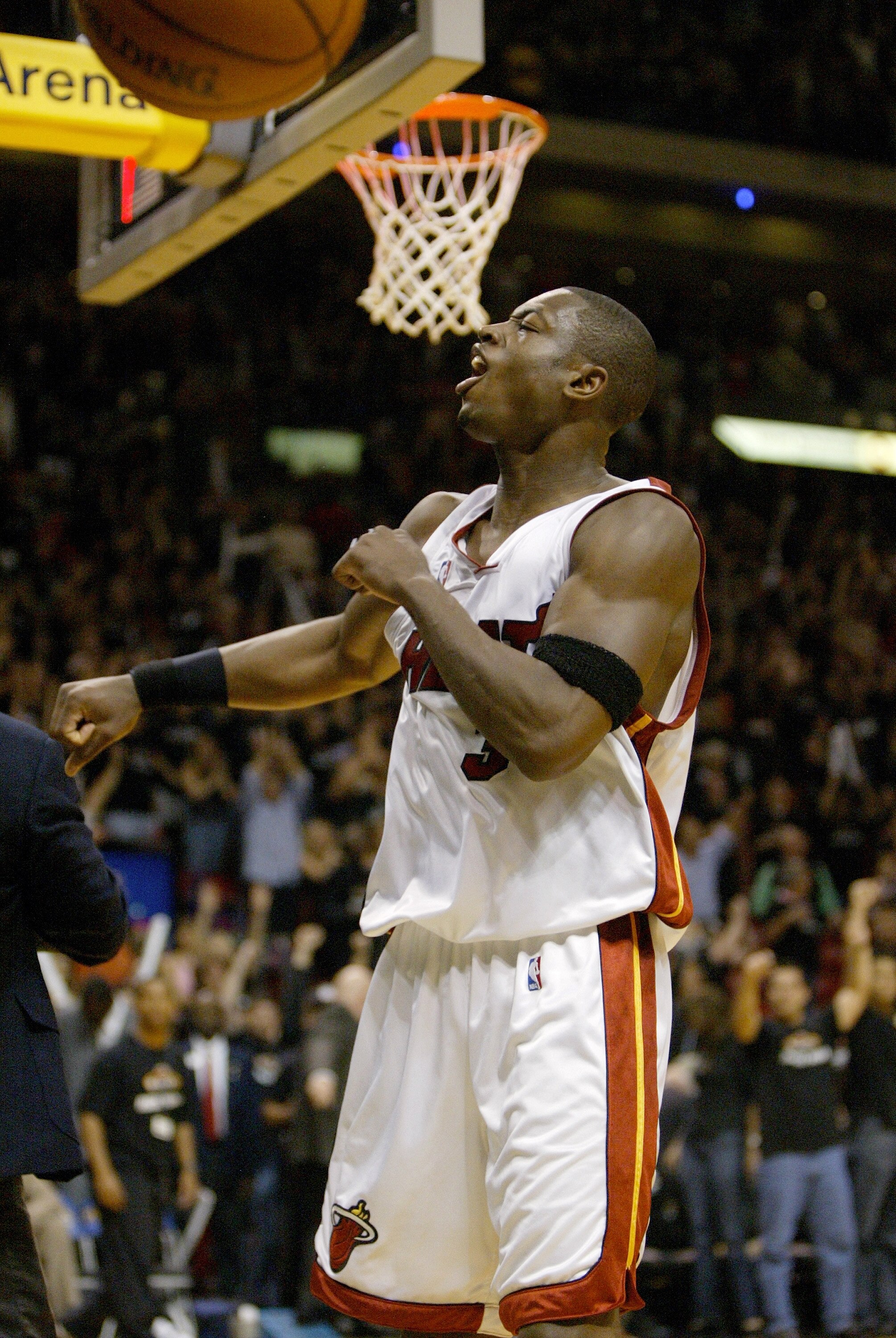 MIAMI - APRIL 18:  Dwyane Wade #3 of the Miami Heat celebrates after the game after hitting the final shot to win 81-79 against the New Orleans Hornets during game one, round one of the 2004 NBA Playoffs April 18, 2004 at the American Airlines Arena in Mi