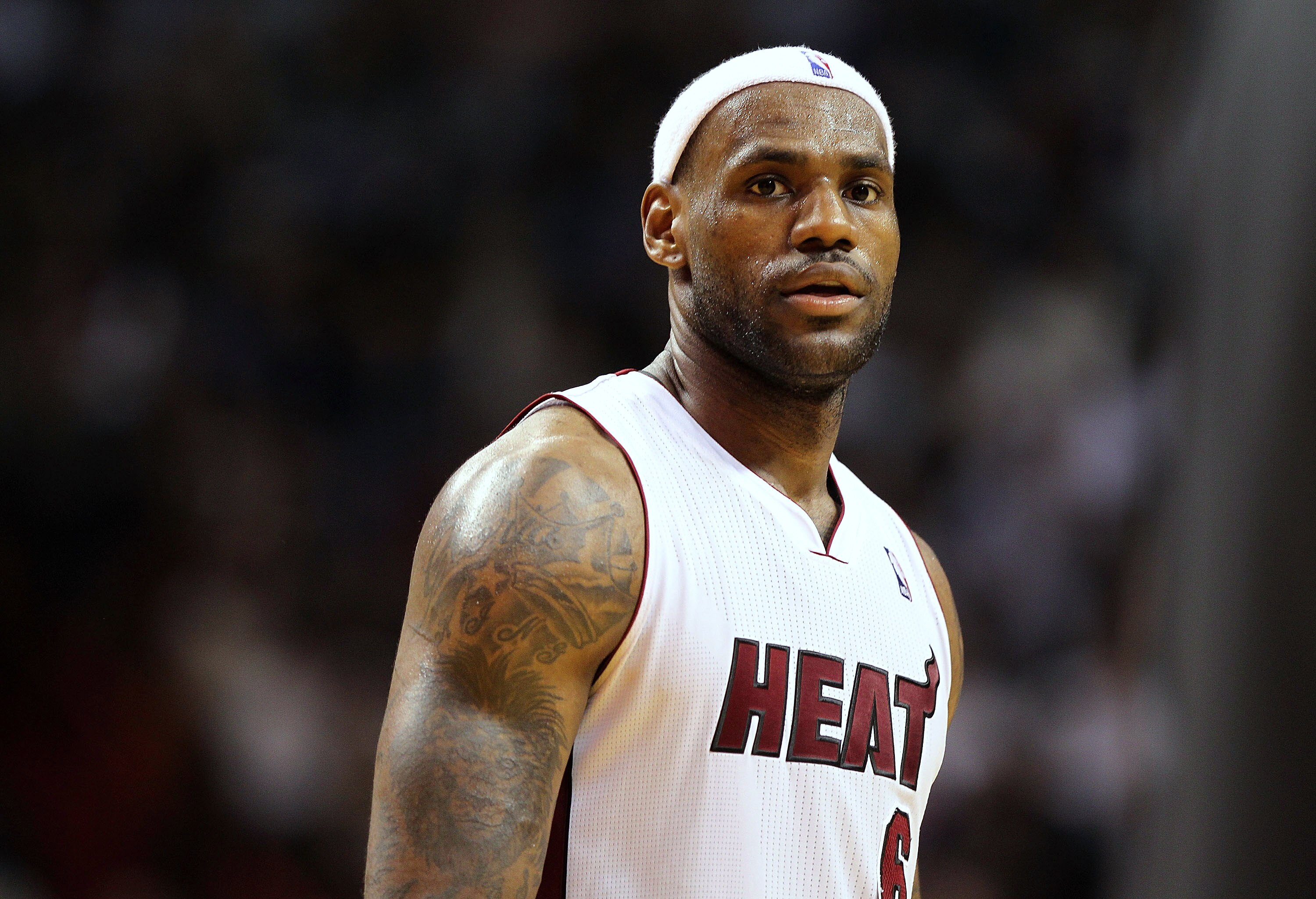MIAMI, FL - JANUARY 22:  LeBron James #6 of the Miami Heat looks on during a game against the Toronto Raptors at American Airlines Arena on January 22, 2011 in Miami, Florida. NOTE TO USER: User expressly acknowledges and agrees that, by downloading and/o