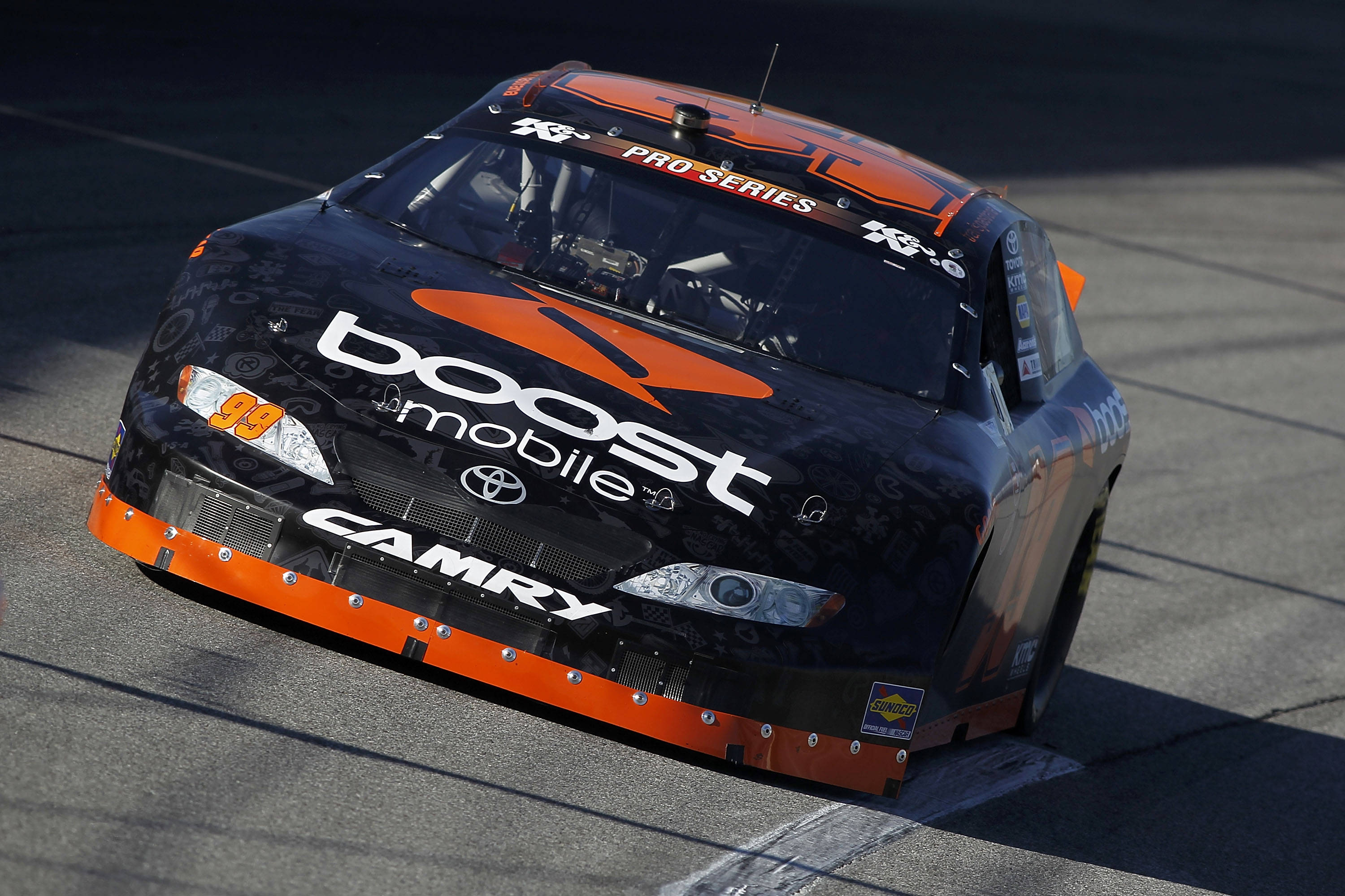 IRWINDALE, CA - JANUARY 28:  Travis Pastrana, driver of the #99 Boost Mobile Toyota, drives during practice for the NASCAR Toyota All-Star Showdown at Toyota Speedway at Irwindale on January 28, 2011 in Irwindale, California.  (Photo by Todd Warshaw/Getty