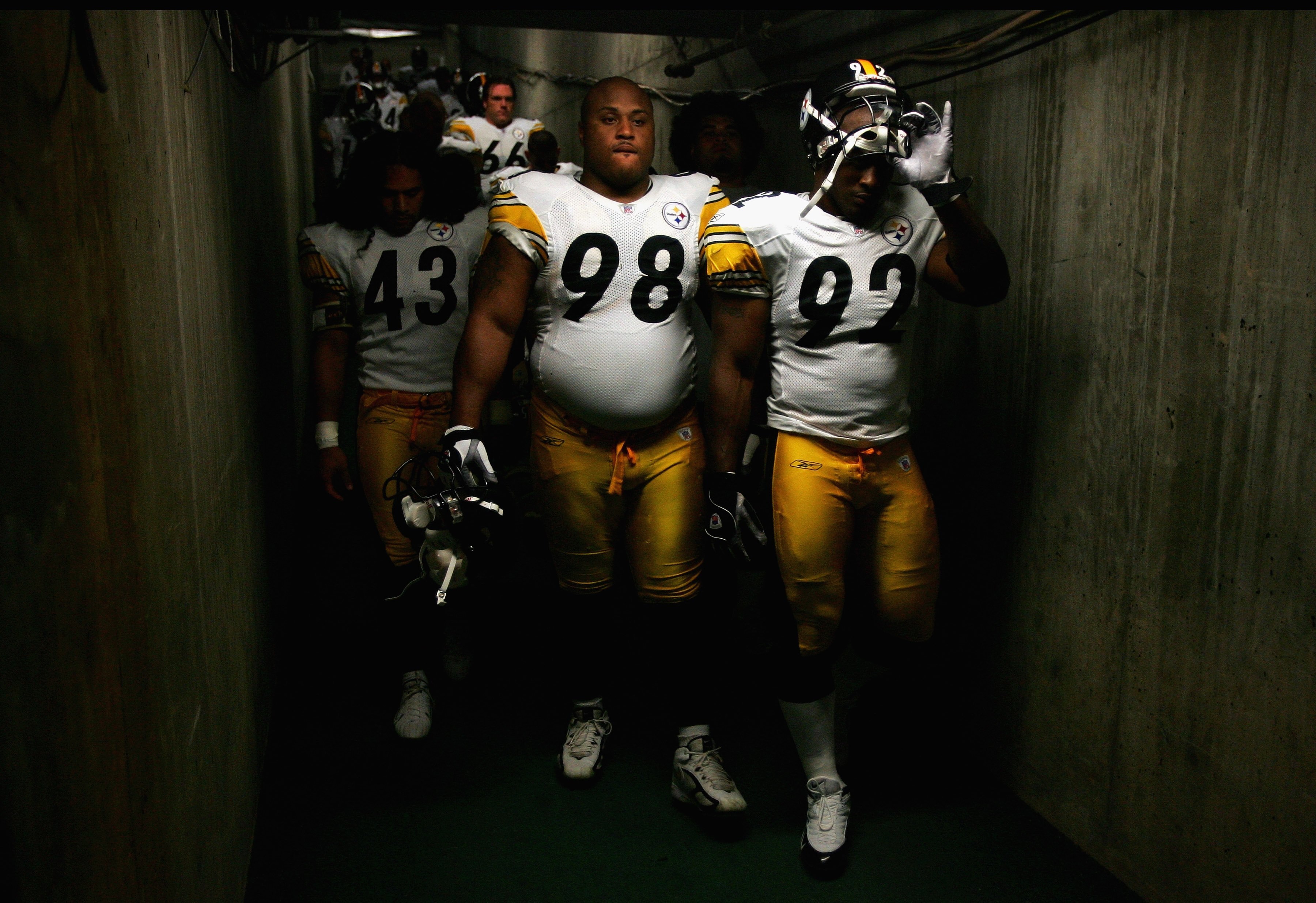 SAN DIEGO - OCTOBER 08:  Troy Polamalu #43, Casey Hampton #98, and James Harrison #92 of the Pittsburgh Steelers enter the game against the San Diego Chargers during the 1st half of their NFL game on October 8, 2006 at Qualcomm Stadium in San Diego, Calif