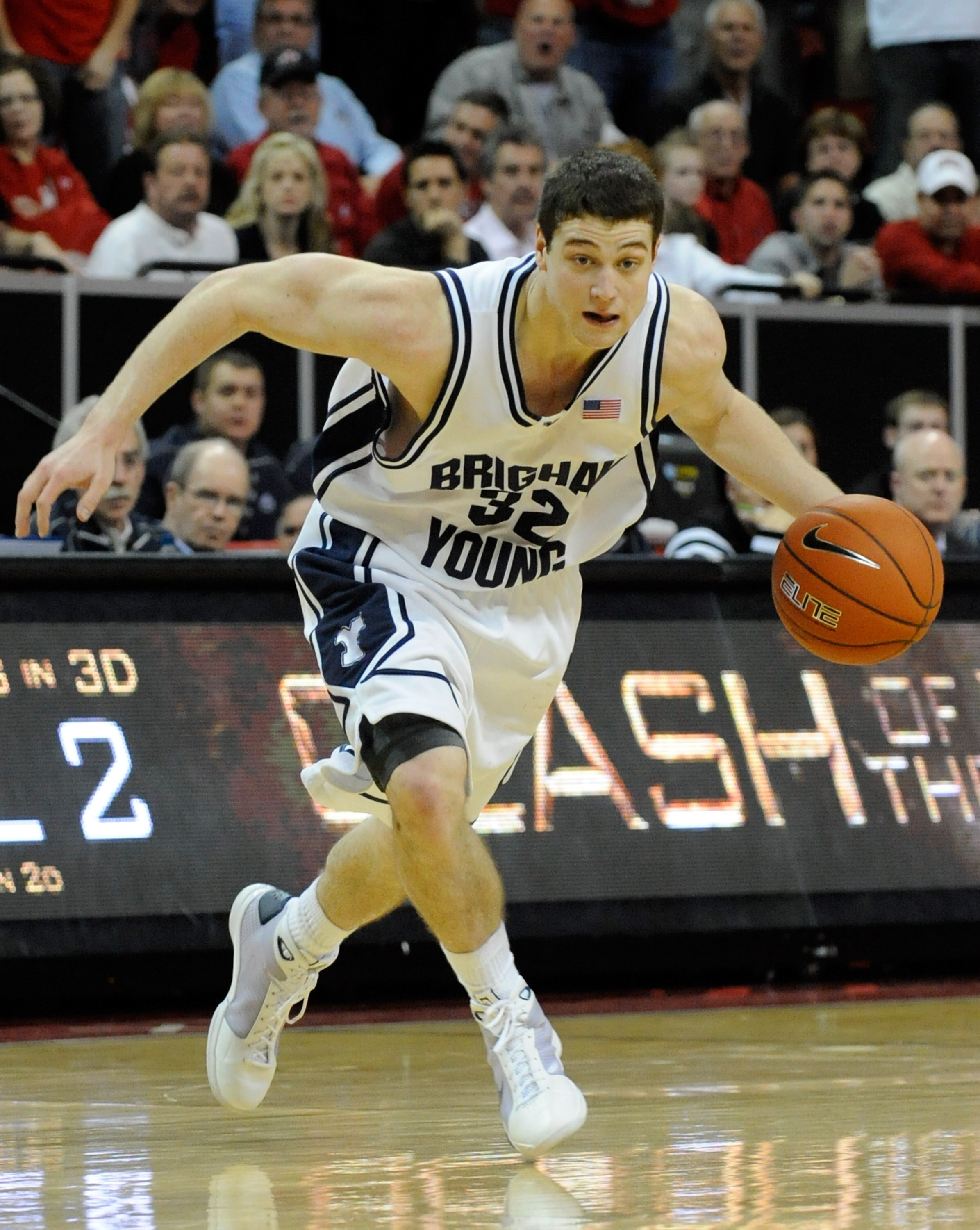 LAS VEGAS - MARCH 12:  Jimmer Fredette #32 of the Brigham Young University Cougars brings the ball up the court against the UNLV Rebels during a semifinal game of the Conoco Mountain West Conference Basketball tournament at the Thomas & Mack Center March