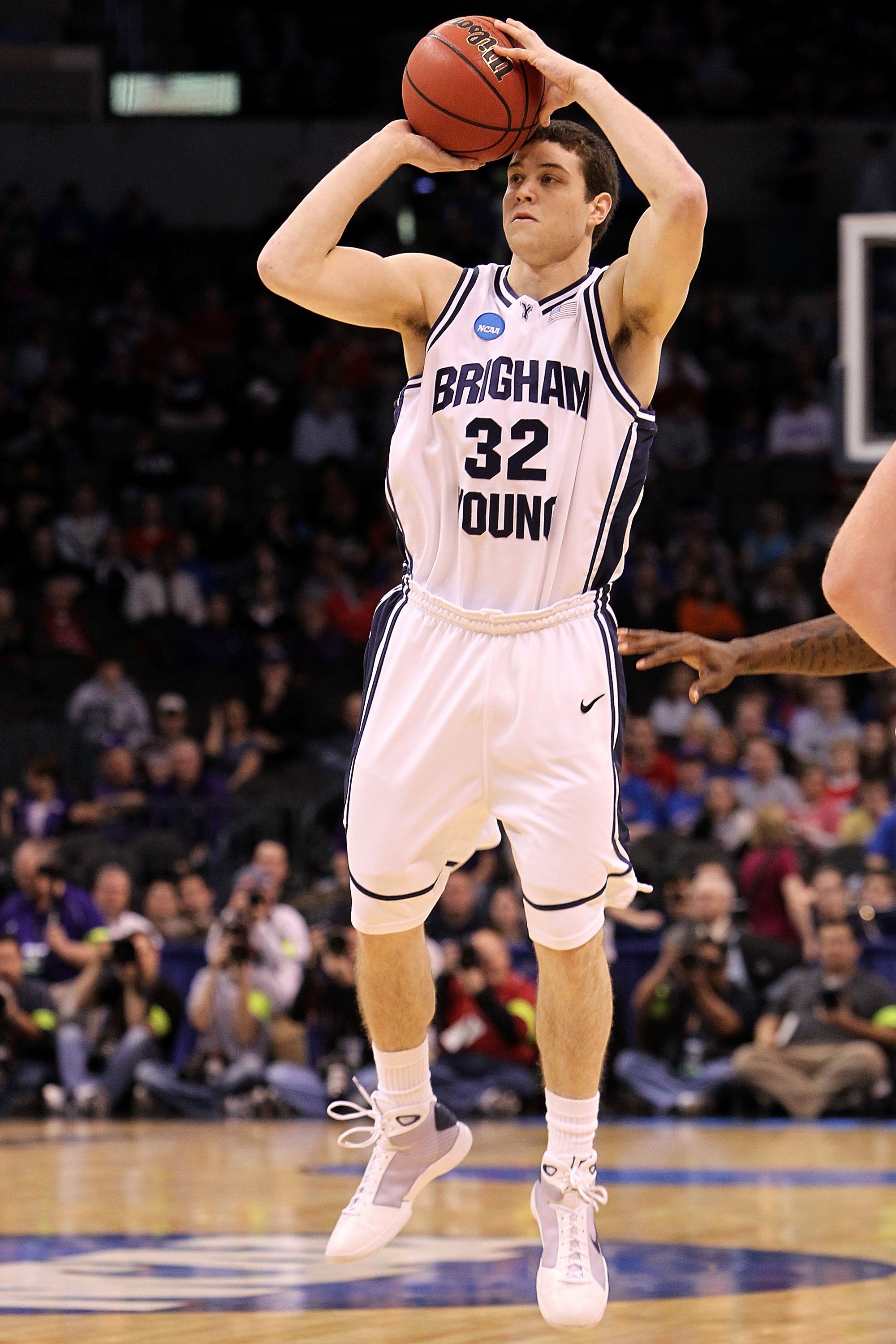 OKLAHOMA CITY - MARCH 18:  Jimmer Fredette #32 of the BYU Cougars attempts a shot against the Florida Gators during the first round of the 2010 NCAA menï¿½s basketball tournament at Ford Center on March 18, 2010 in Oklahoma City, Oklahoma. BYU won 99-92 in