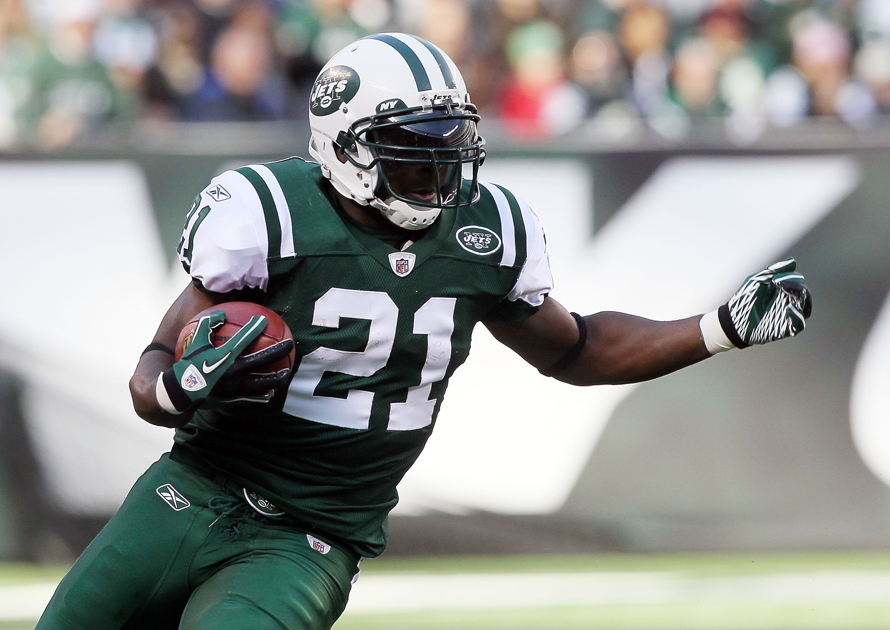 EAST RUTHERFORD, NJ - NOVEMBER 21:  LaDainian Tomlinson #21 of the New York Jets runs against the Houston Texans on November 21, 2010 at the New Meadowlands Stadium in East Rutherford, New Jersey.  (Photo by Jim McIsaac/Getty Images)