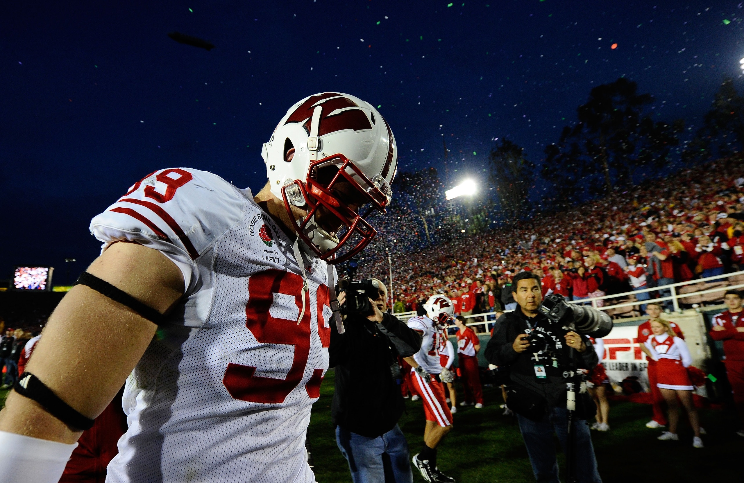 PASADENA, CA - JANUARY 01: Defensive lineman J.J. Watt #99 of the Wisconsin Badgers walks off the field after losing 21-19 to the TCU Horned Frogs in the 97th Rose Bowl game on January 1, 2011 in Pasadena, California. (Photo by Kevork Djansezian/Getty I PASADENA, CA - JANUARY 01: Defensive lineman J.J. Watt #99 of the Wisconsin Badgers walks off the field after losing 21-19 to the TCU Horned Frogs in the 97th Rose Bowl game on January 1, 2011 in Pasadena, California. (Photo by Kevork Djansezian/Getty I