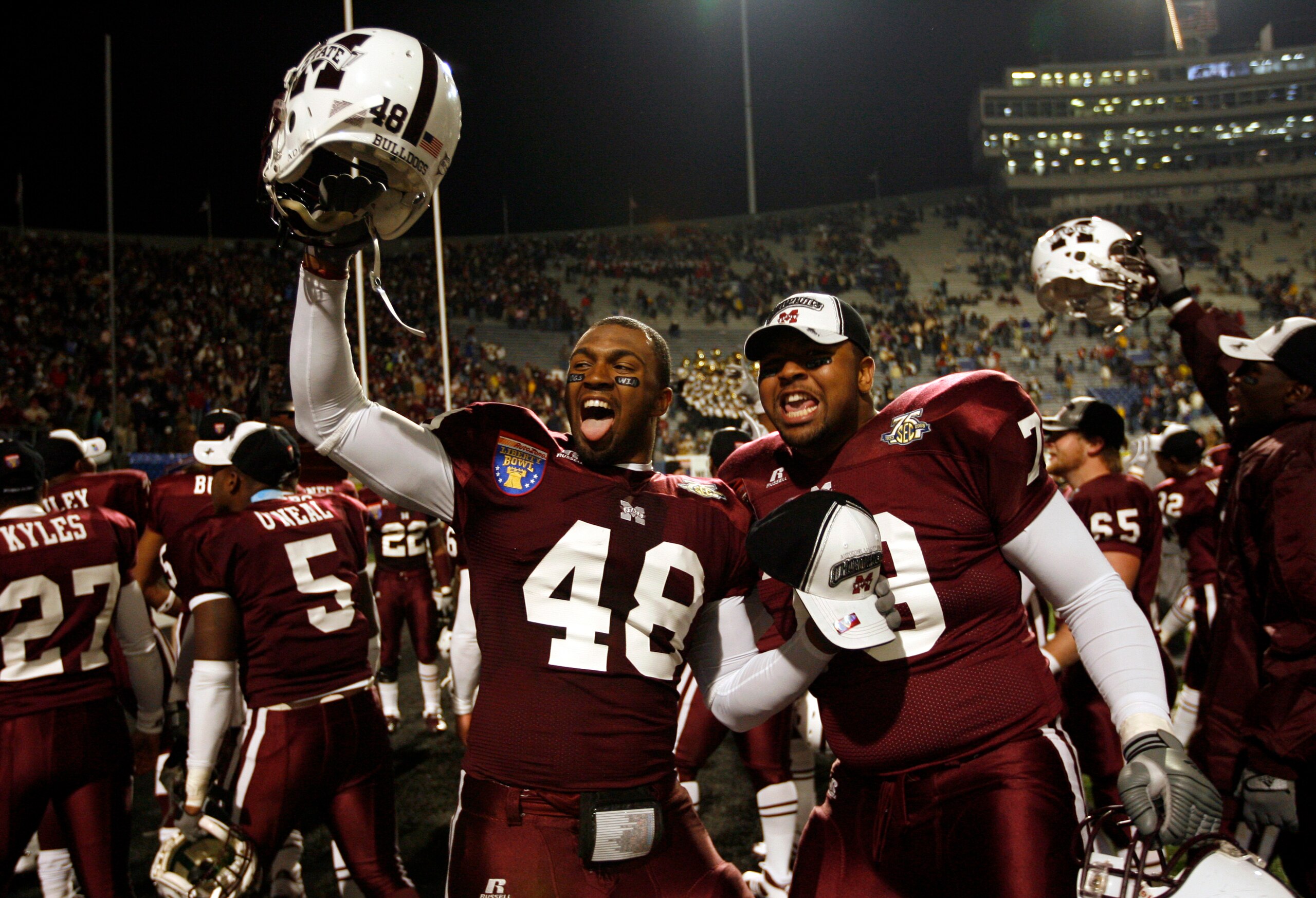 MEMPHIS, TN - DECEMBER 29:  Dezmond Sherrod #48 and Michael Gates #78 of the Mississippi State Bulldogs celebrate their win over the UCF Knights during the 49th Annual Autozone Liberty Bowl at Liberty Bowl Memorial Stadium December 29, 2007 in Memphis, Te