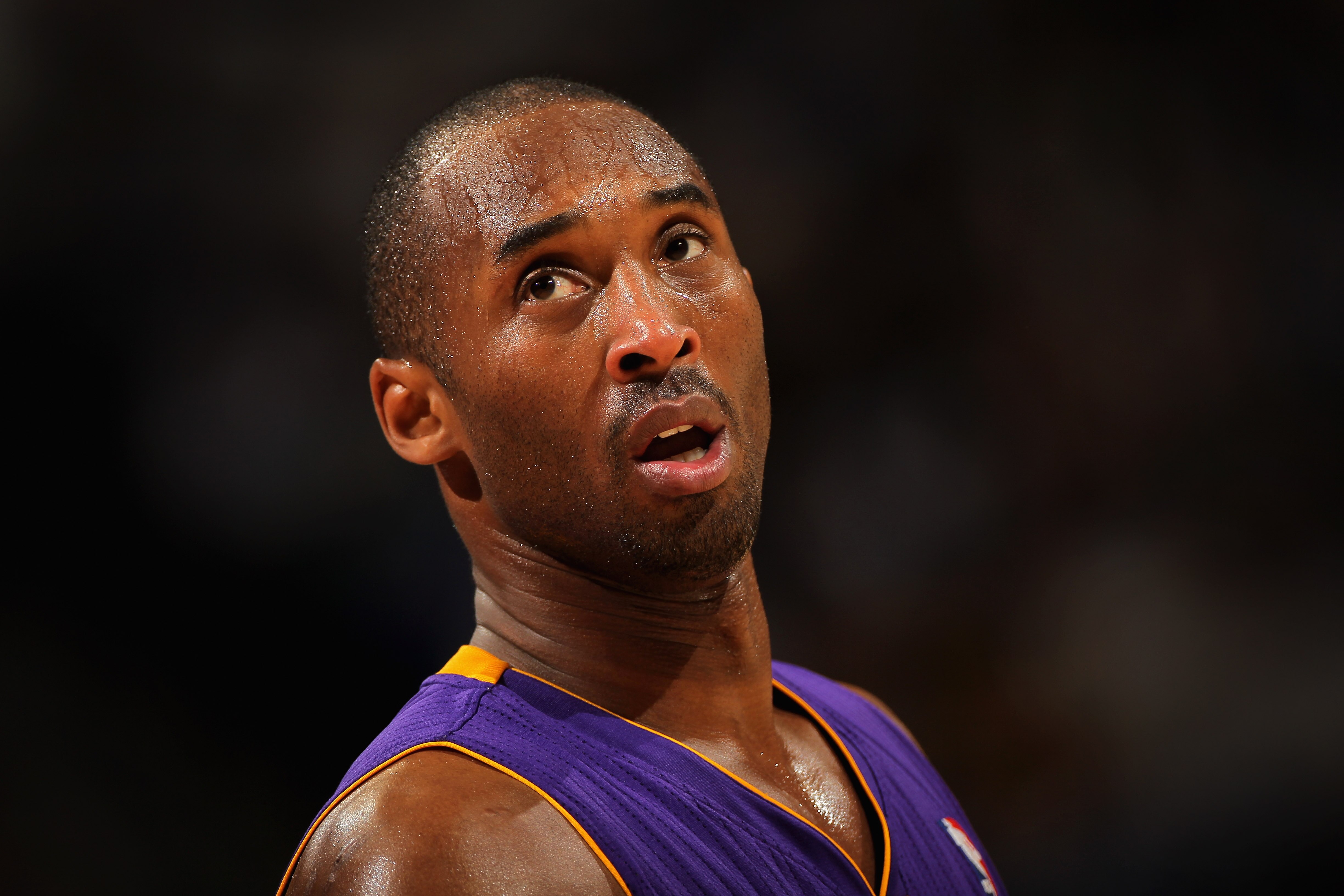DENVER, CO - JANUARY 21:  Kobe Bryant #24 of the Los Angeles Lakers looks on during a break in the action against the Denver Nuggets at the Pepsi Center on January 21, 2011 in Denver, Colorado. The Lakers defeated the Nuggets 97-107. NOTE TO USER: User ex