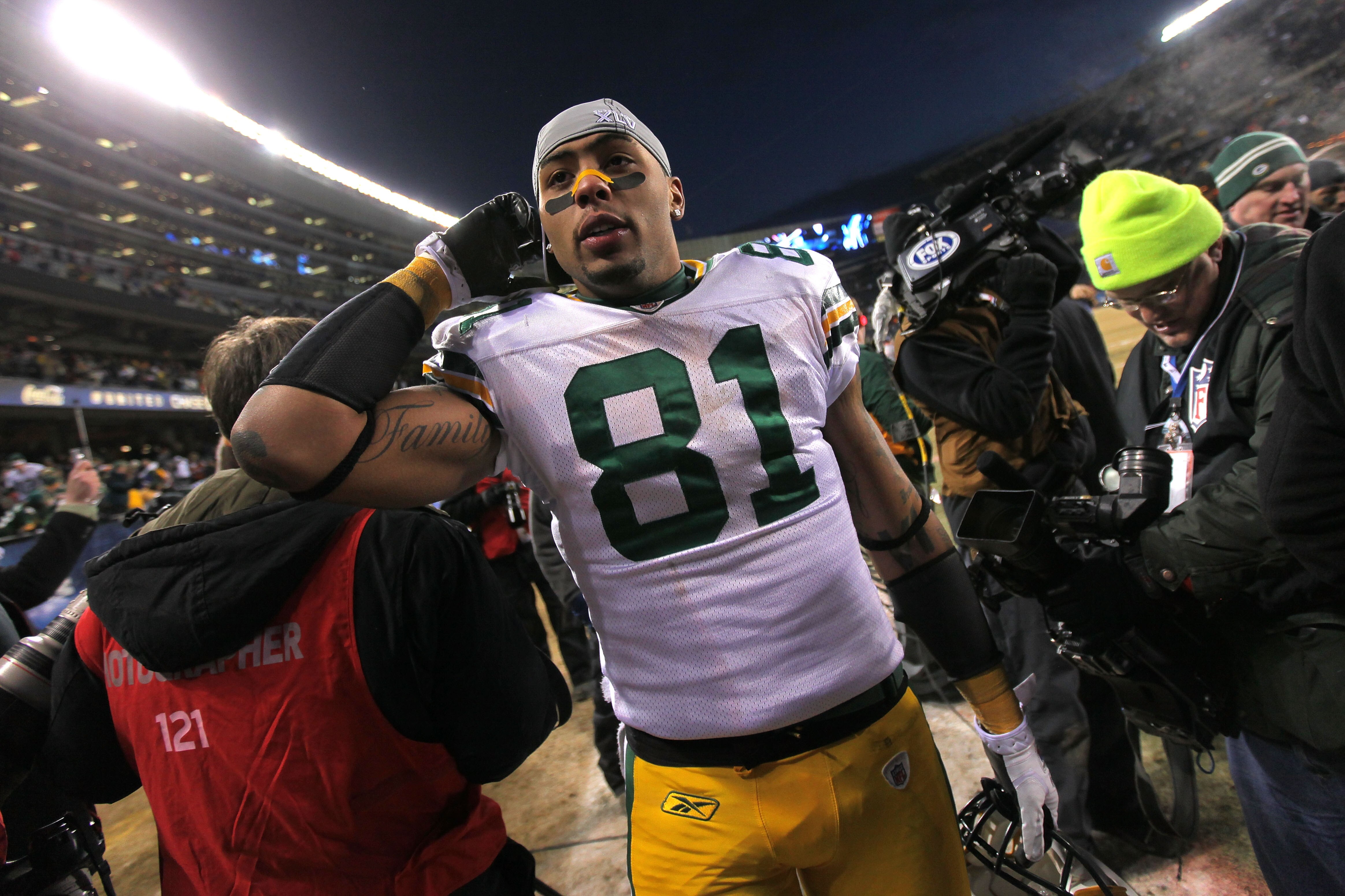 CHICAGO, IL - JANUARY 23:  Andrew Quarless #81 of the Green Bay Packers celebrates after the Packers 21-14 victory against the Chicago Bears in the NFC Championship Game at Soldier Field on January 23, 2011 in Chicago, Illinois.  (Photo by Doug Pensinger/