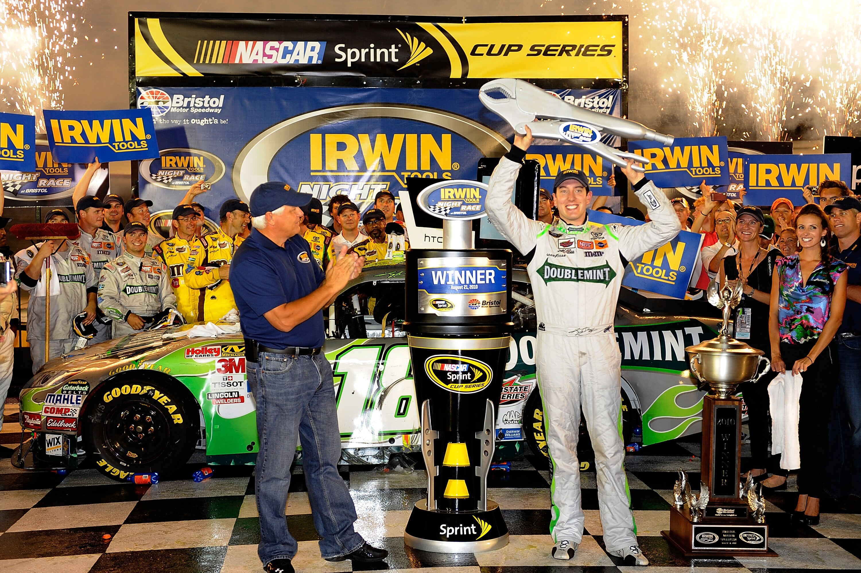 BRISTOL, TN - AUGUST 21:  Kyle Busch, driver of the #18 Doublemint Toyota, poses in Victory Lane after winning the NASCAR Sprint Cup Series IRWIN Tools Night Race at Bristol Motor Speedway on August 21, 2010 in Bristol, Tennessee.  (Photo by John Harrelso