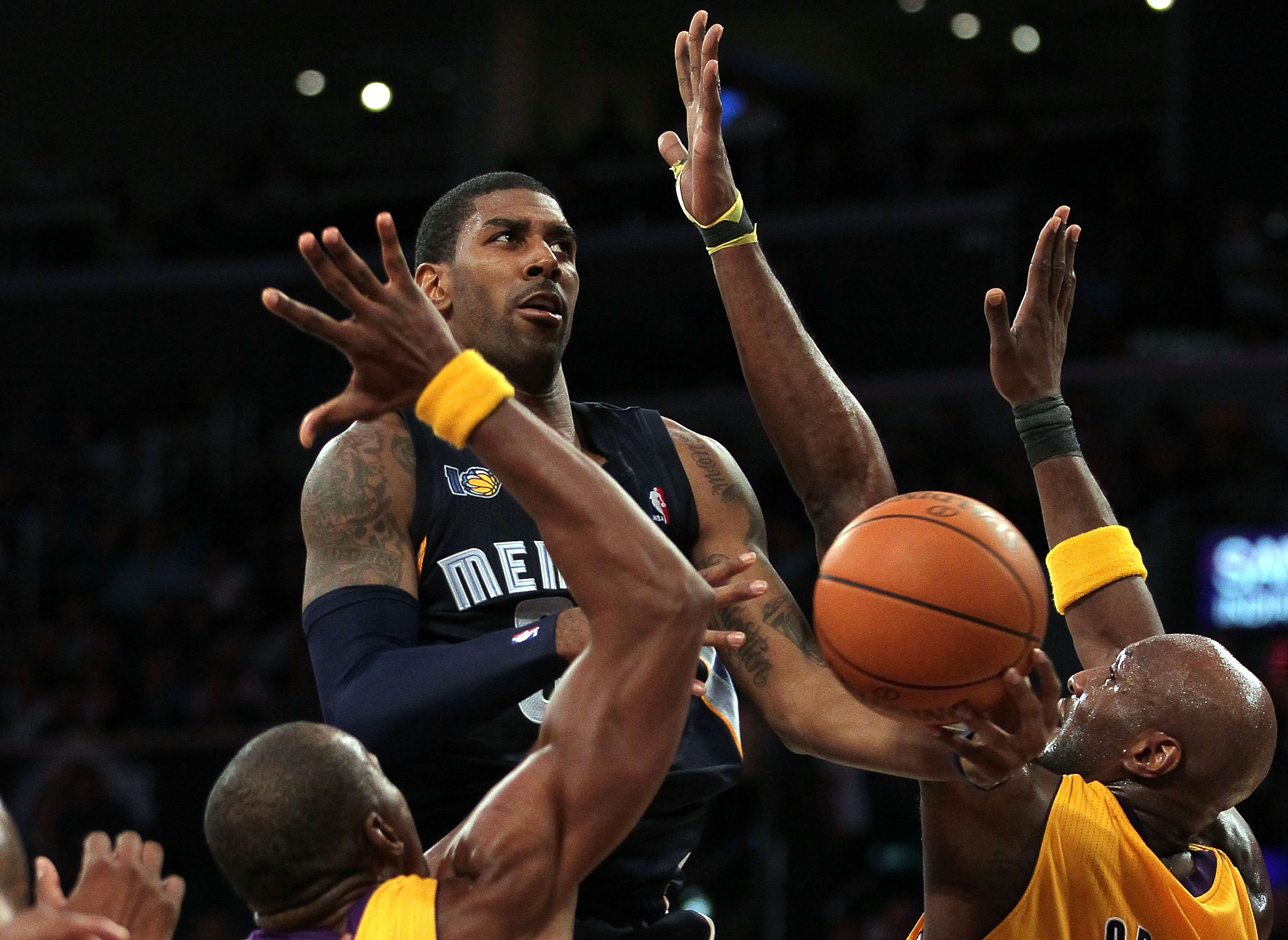 LOS ANGELES, CA - NOVEMBER 02:  O.J. Mayo #32 of the Memphis Grizzlies attempts a lay up against the Los Angeles Lakers during the game at Staples Center on November 2, 2010 in Los Angeles, California. The Lakers defeated the Grizzlies 124-105. NOTE TO US
