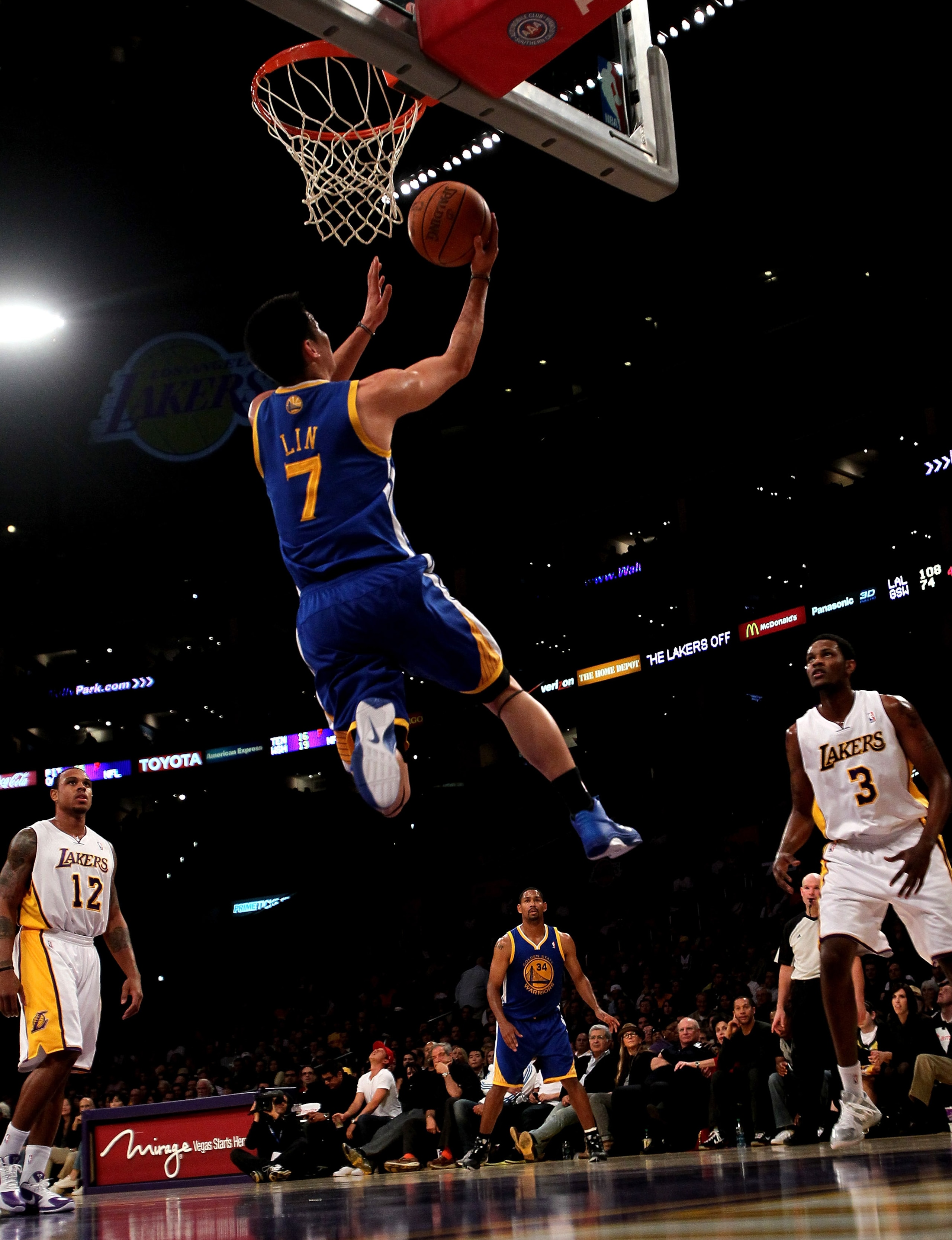 LOS ANGELES - NOVEMBER 21:  Jeremy Lin #7 of the Golden State Warriors goes up for a basket against the Los Angeles Lakers at Staples Center on November 21, 2010 in Los Angeles, California.   The Lakers won 117-89. NOTE TO USER: User expressly acknowledge