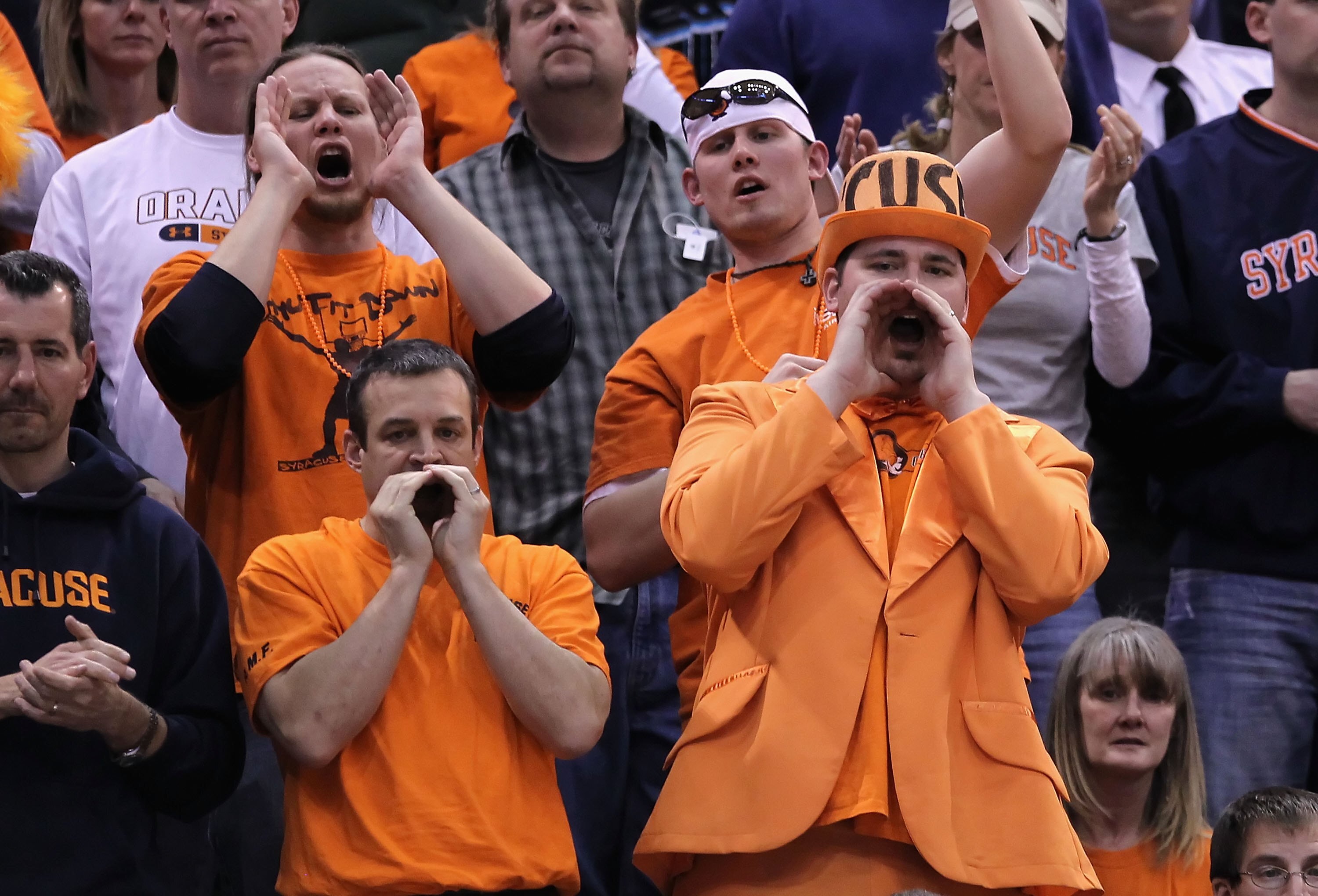 SALT LAKE CITY - MARCH 25:  Fans of the Syracuse Orange cheer against the Butler Bulldogs during the west regional semifinal of the 2010 NCAA men's basketball tournament at the Energy Solutions Arena on March 25, 2010 in Salt Lake City, Utah.  (Photo by C