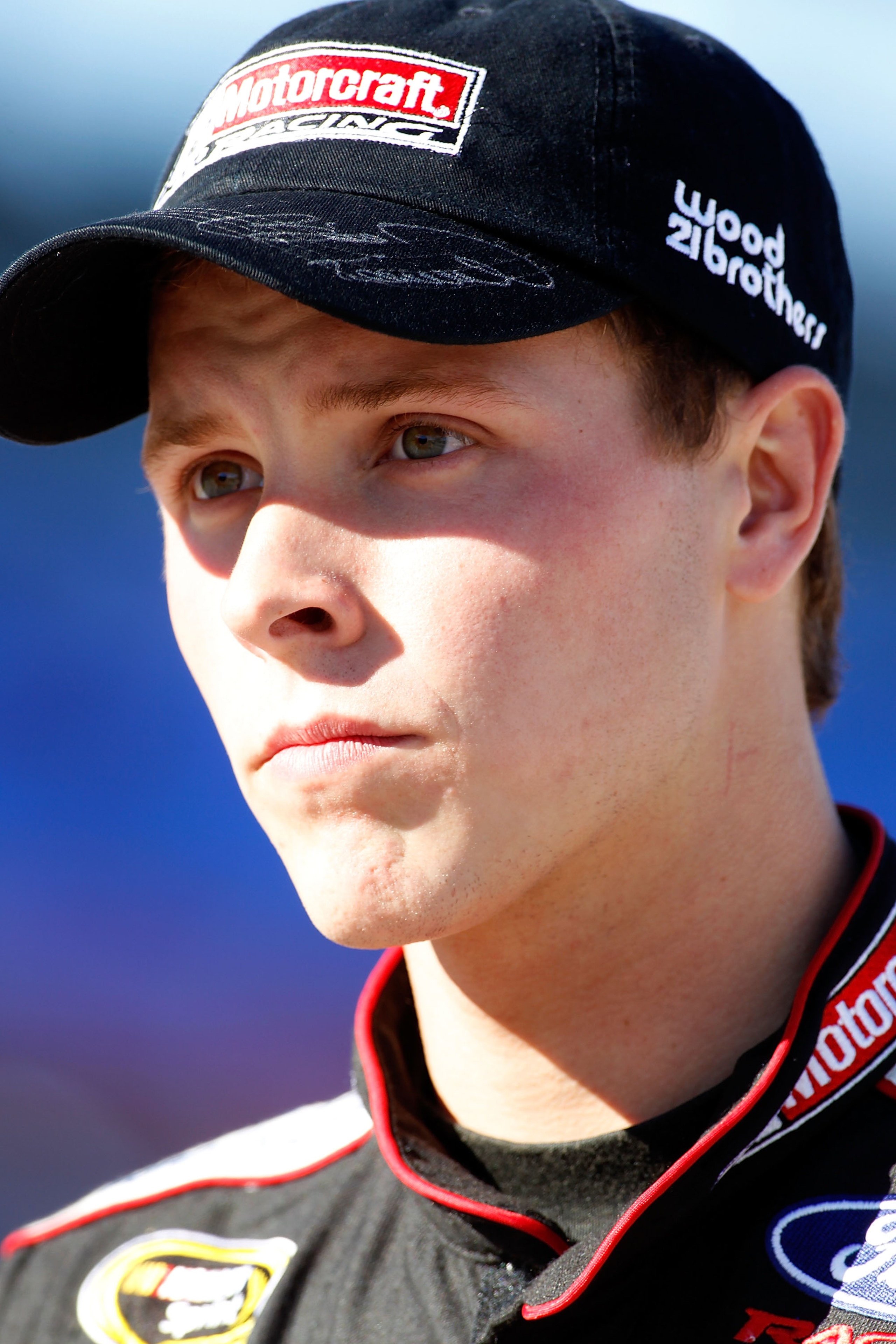 FORT WORTH, TX - NOVEMBER 05: Trevor Bayne, driver of the #21 Motorcraft/Quick Lane Ford, walks on the grid during qualifying for the NASCAR Sprint Cup Series AAA Texas 500 at Texas Motor Speedway on November 5, 2010 in Fort Worth, Texas. (Photo by Todd FORT WORTH, TX - NOVEMBER 05: Trevor Bayne, driver of the #21 Motorcraft/Quick Lane Ford, walks on the grid during qualifying for the NASCAR Sprint Cup Series AAA Texas 500 at Texas Motor Speedway on November 5, 2010 in Fort Worth, Texas. (Photo by Todd