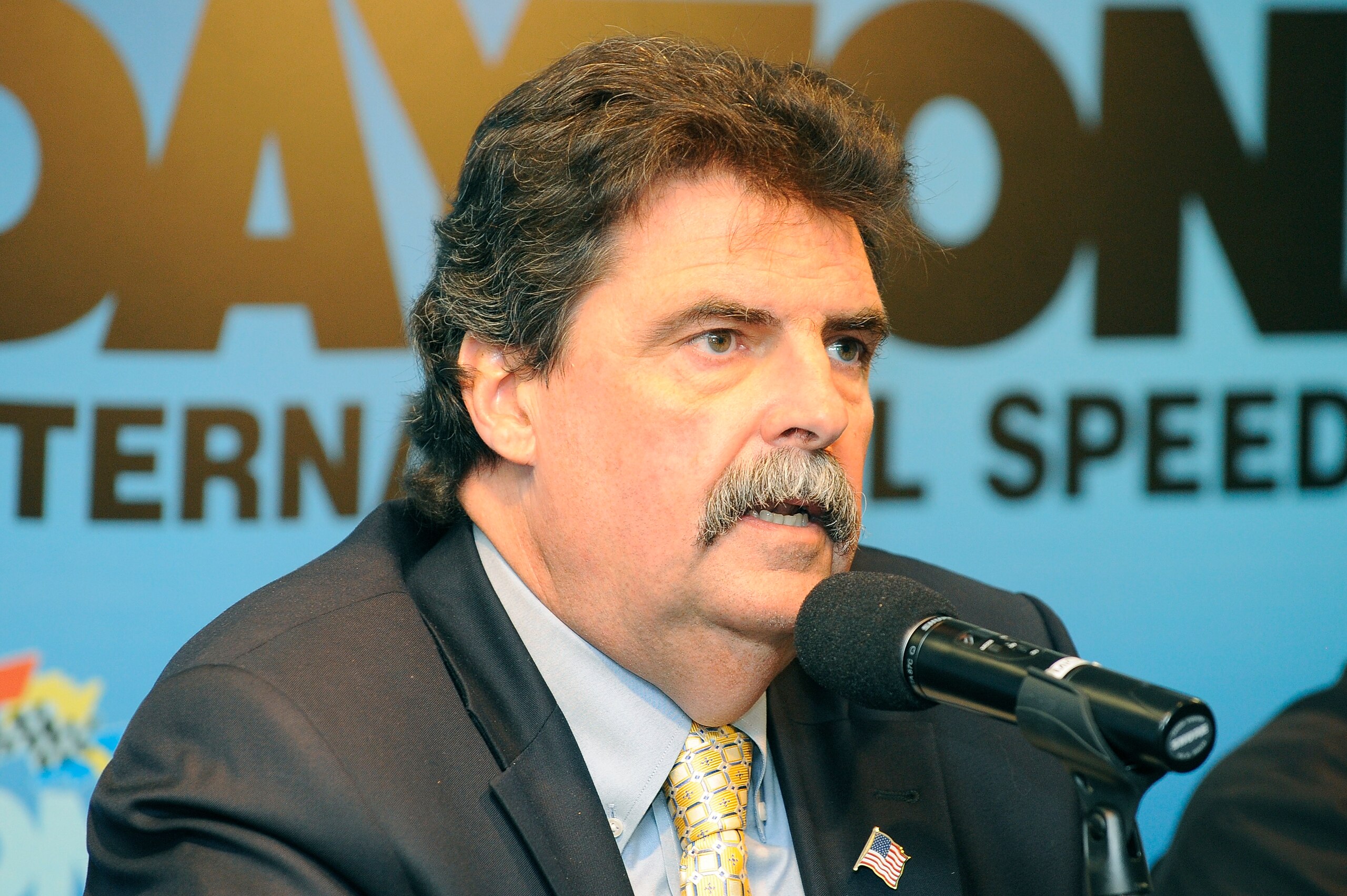 DAYTONA BEACH, FL - JANUARY 21: Mike Helton, NASCAR President, updates the media on the competition in NASCAR at Daytona International Speedway on January 21, 2011 in Daytona Beach, Florida. (Photo by Jared C. Tilton/Getty Images for NASCAR) DAYTONA BEACH, FL - JANUARY 21: Mike Helton, NASCAR President, updates the media on the competition in NASCAR at Daytona International Speedway on January 21, 2011 in Daytona Beach, Florida. (Photo by Jared C. Tilton/Getty Images for NASCAR)