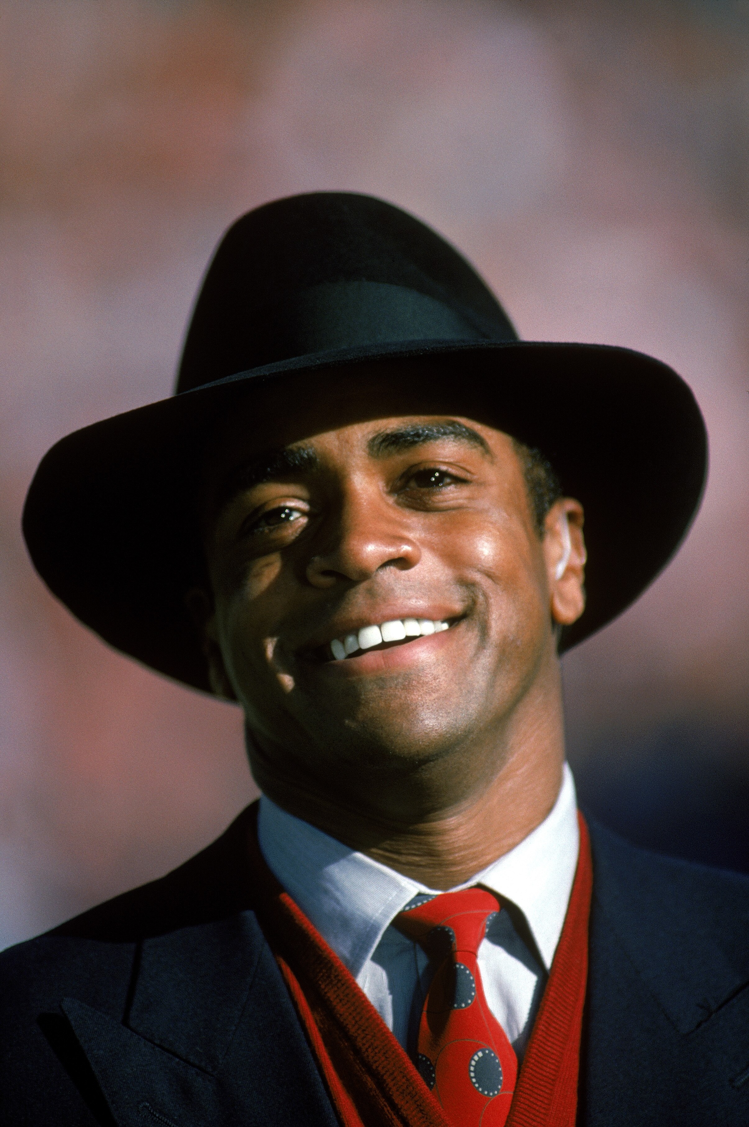 DENVER - JANUARY 17: NBC Commentator Ahmad Rashad looks on during the 1987 AFC Championship game with the Cleveland Browns against the Denver Broncos at the Mile High Stadium on January 17, 1988 in Denver, Colorado. The Broncos won 38-33. (Photo by George