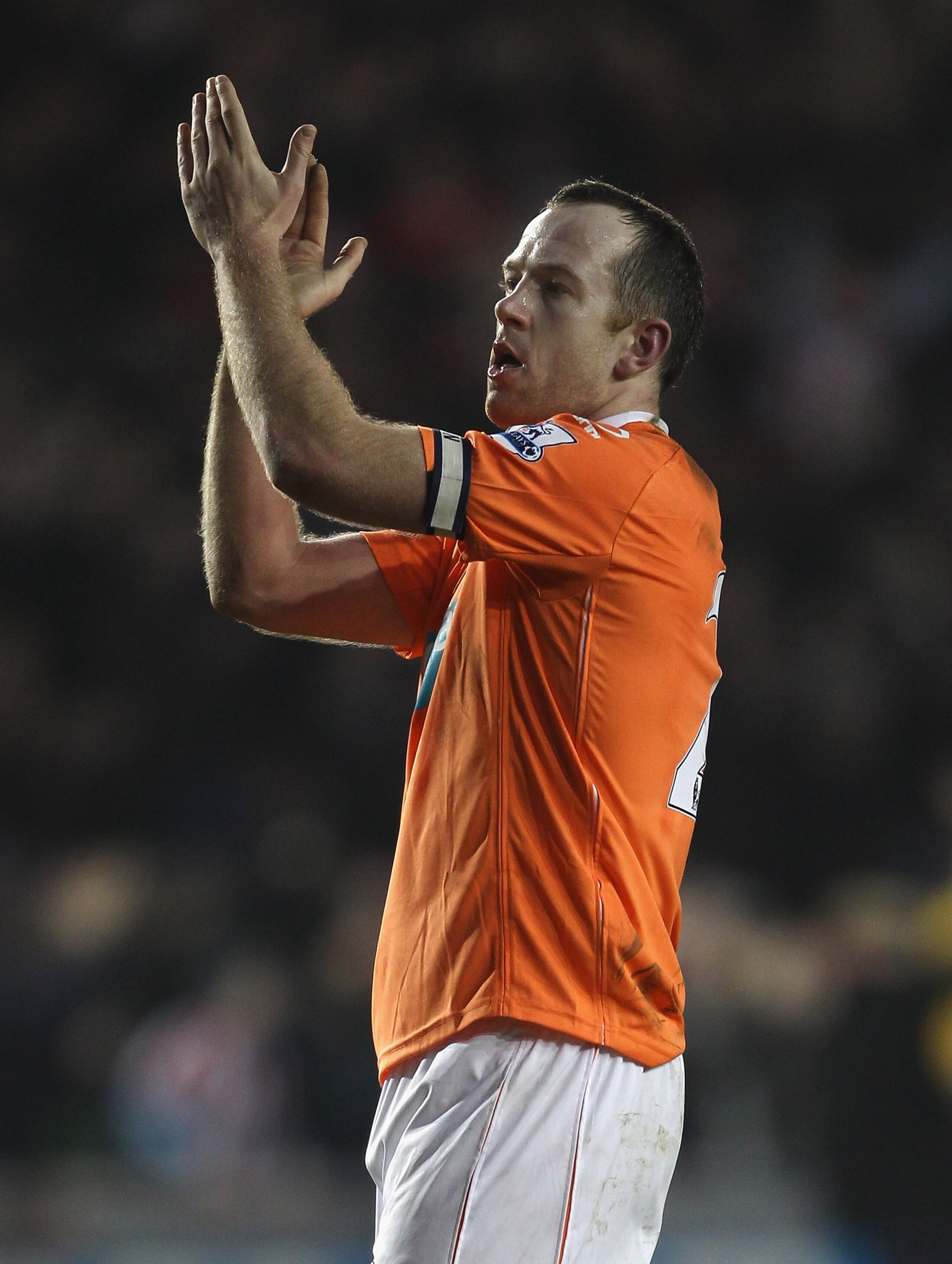 BLACKPOOL, ENGLAND - JANUARY 22:  Charlie Adam of Blackpool claps his supporters after the Barclays Premier League match between Blackpool and Sunderland at Bloomfield Road on January 22, 2011 in Blackpool, England.  (Photo by Alex Livesey/Getty Images)