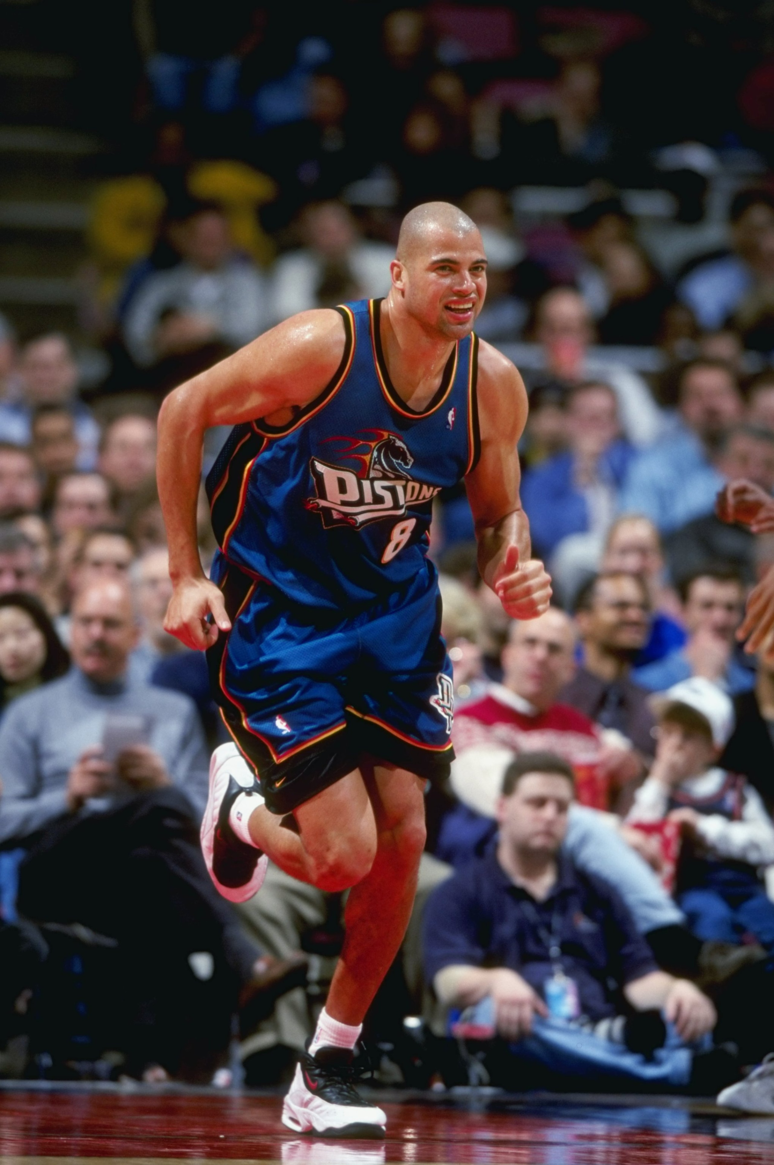 24 Mar 1999: Bison Dele #8 of the Detroit Pistons smiles as he runs down the court during a game against the New Jersey Nets at the Continental Airlines Arena in East Rutherford, New Jersey. The Piston defeated the Nets 84-71. 24 Mar 1999: Bison Dele #8 of the Detroit Pistons smiles as he runs down the court during a game against the New Jersey Nets at the Continental Airlines Arena in East Rutherford, New Jersey. The Piston defeated the Nets 84-71.