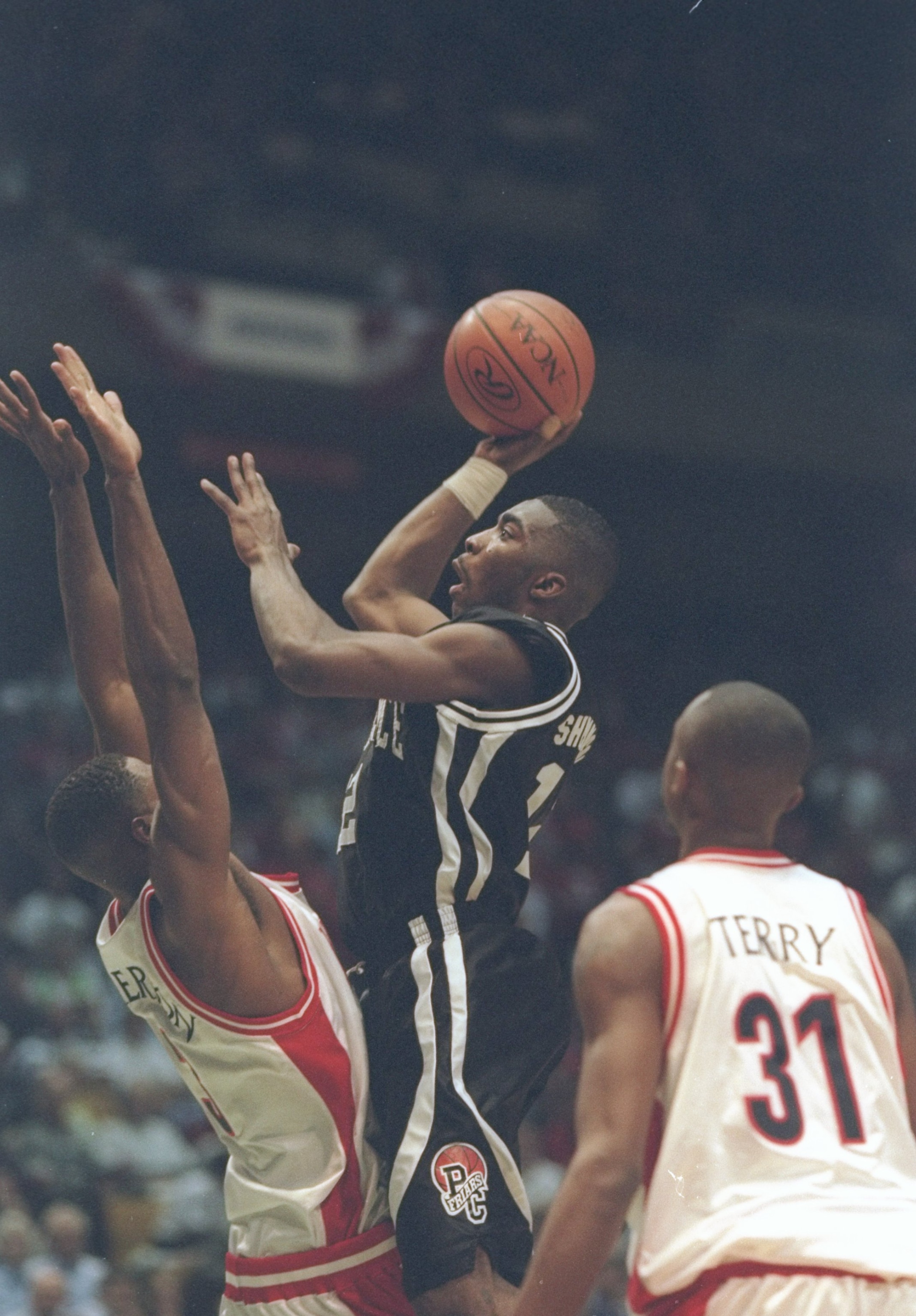 Special to the Washington Times Star: File photo: 23 Mar 1997: Guard God Shammgod of the Providence Friars shoots over forward Michael Dickerson and guard Jason Terry of the Arizona Wildcats at the Birmingham-Jefferson Civic Center, in Birmingham, Alab Special to the Washington Times Star: File photo: 23 Mar 1997: Guard God Shammgod of the Providence Friars shoots over forward Michael Dickerson and guard Jason Terry of the Arizona Wildcats at the Birmingham-Jefferson Civic Center, in Birmingham, Alab