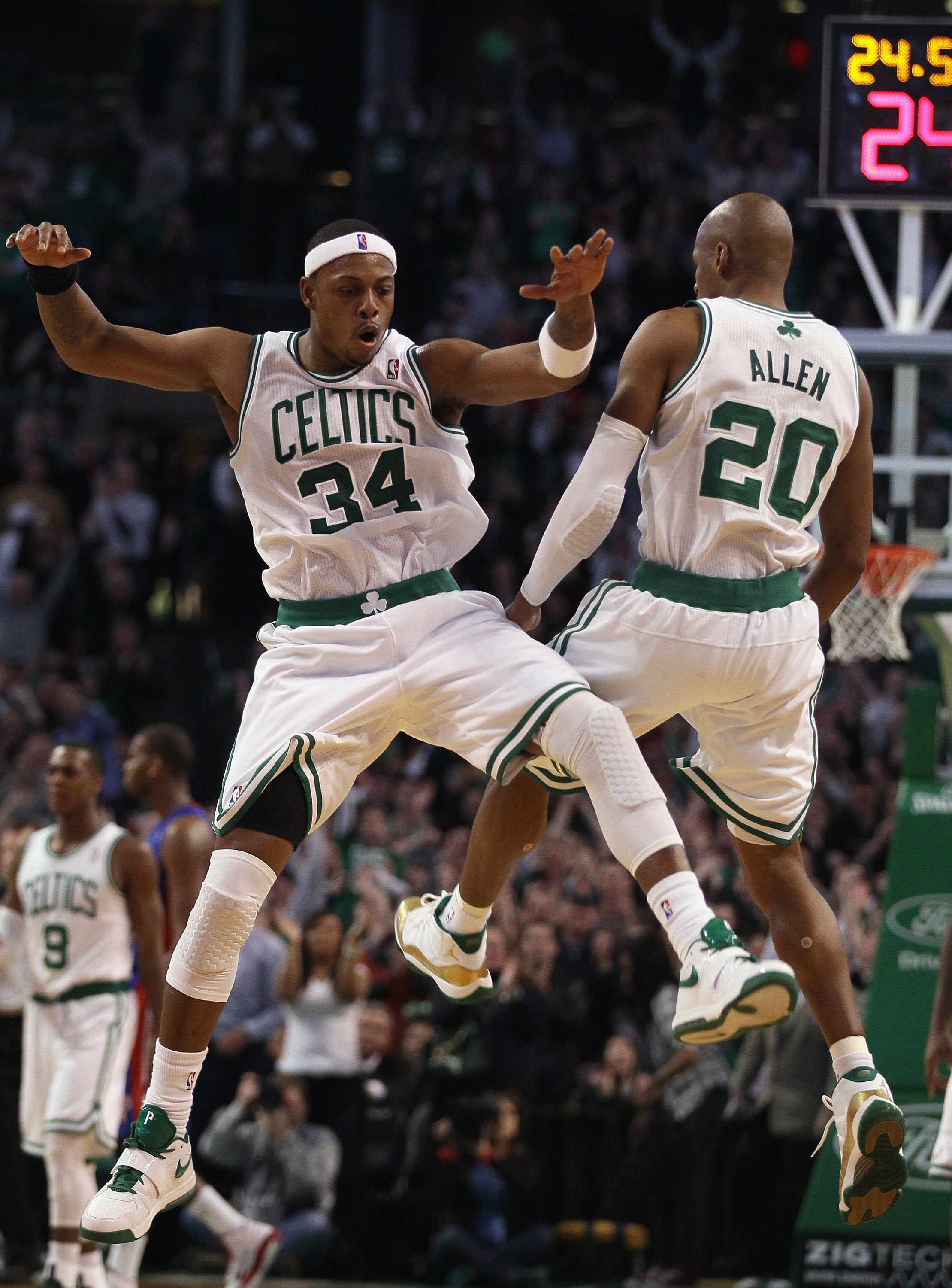 BOSTON, MA - JANUARY 19:  Ray Allen #20 of the Boston Celtics celebrates his game winning shot with teammate Paul Pierce #34 during the final seconds of the game against the Detroit Pistons on January 19, 2011 at the TD Garden in Boston, Massachusetts. Th