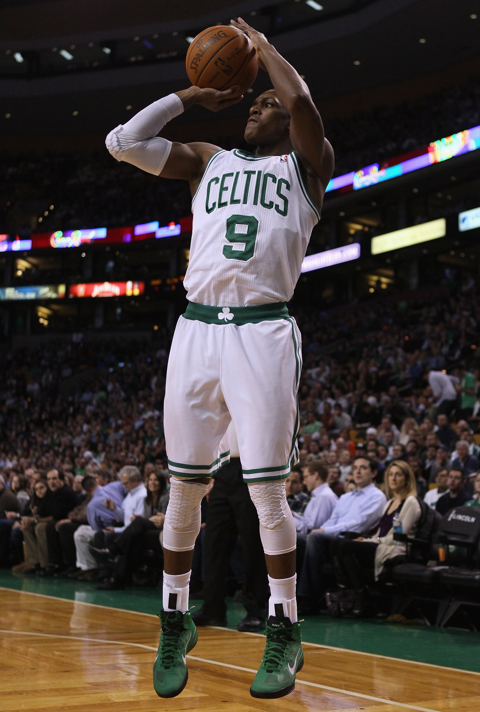 BOSTON, MA - JANUARY 19:  Rajon Rondo #9 of the Boston Celtics takes a shot in the first quarter against the Detroit Pistons on January 19, 2011 at the TD Garden in Boston, Massachusetts.  NOTE TO USER: User expressly acknowledges and agrees that, by down