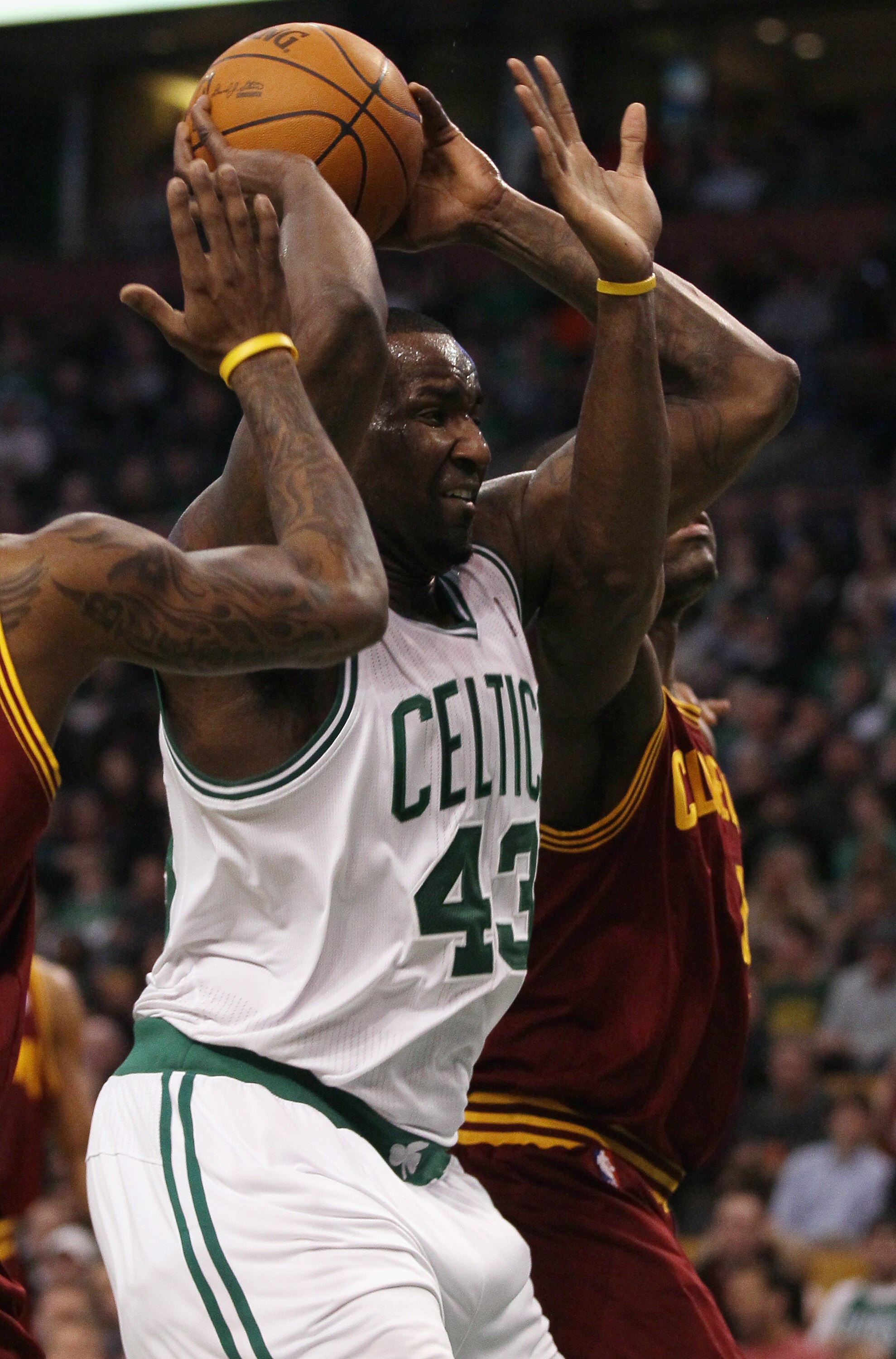 BOSTON, MA - JANUARY 25:  Kendrick Perkins #43  of the Boston Celtics is fouled by Antawn Jamison #4  of the of the Cleveland Cavaliers on January 25, 2011 at the TD Garden in Boston, Massachusetts. The Celtics defeated the Cavaliers 112-95.  NOTE TO USER