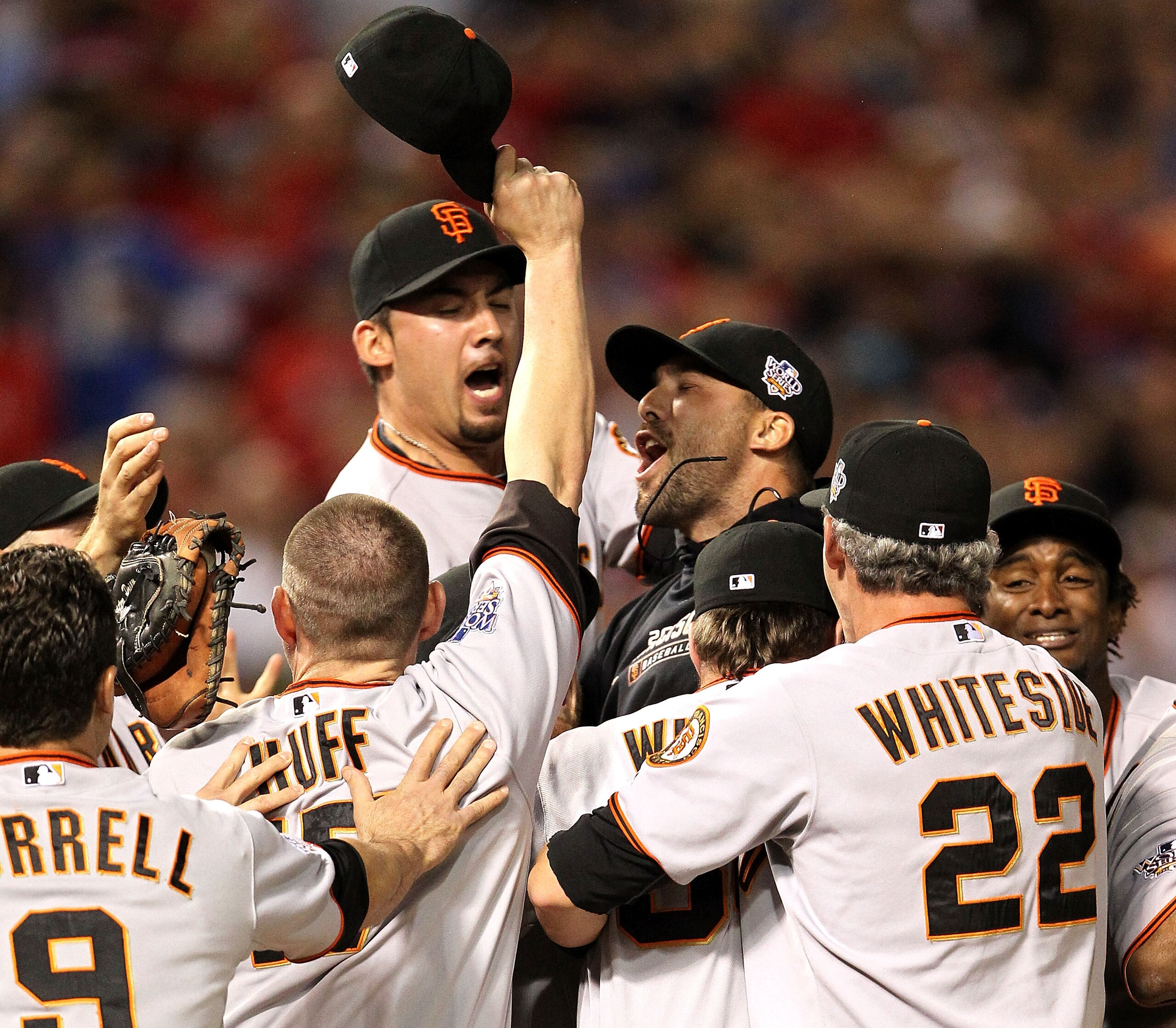 ARLINGTON, TX - NOVEMBER 01:  Mark DeRosa (C) of the San Francisco Giants celebrates with his teammates after they won the World Series against the Texas Rangers in Game Five of the 2010 MLB World Series at Rangers Ballpark in Arlington on November 1, 201