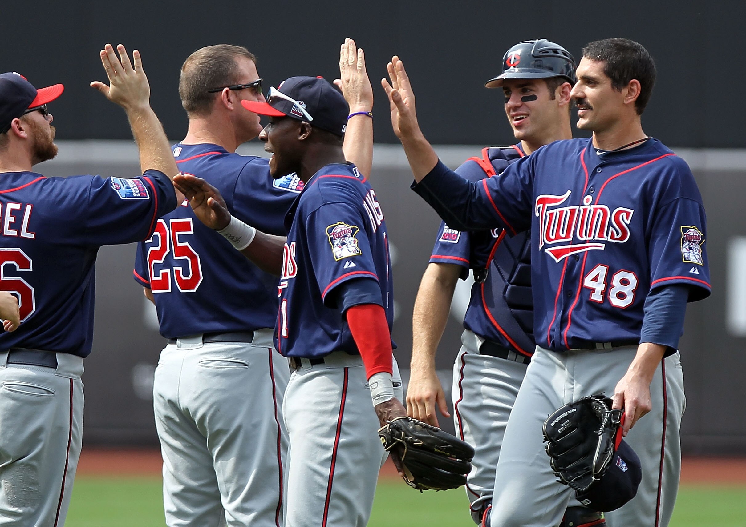 NEW YORK - JUNE 26:  Carl Pavano #48 of the Minnesota Twins celebrates the win with teammates against the New York Mets at Citi Field on June 26, 2010 in the Flushing neighborhood of the Queens borough of New York City.  (Photo by Nick Laham/Getty Images)