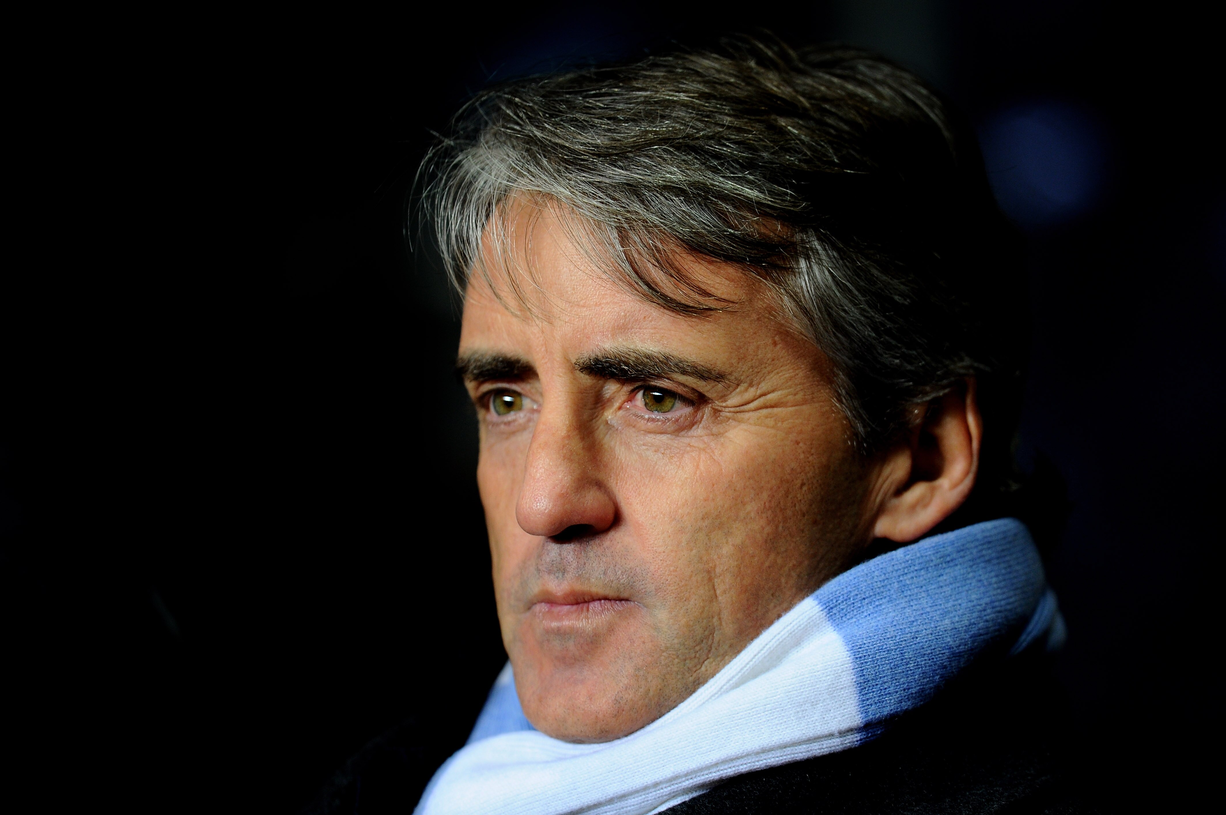 BIRMINGHAM, ENGLAND - JANUARY 22:  Roberto Mancini the Manchester City manager looks on during the Barclays Premier League match between Aston Villa and Manchester City at Villa Park on January 22, 2011 in Birmingham, England.  (Photo by Clive Mason/Getty