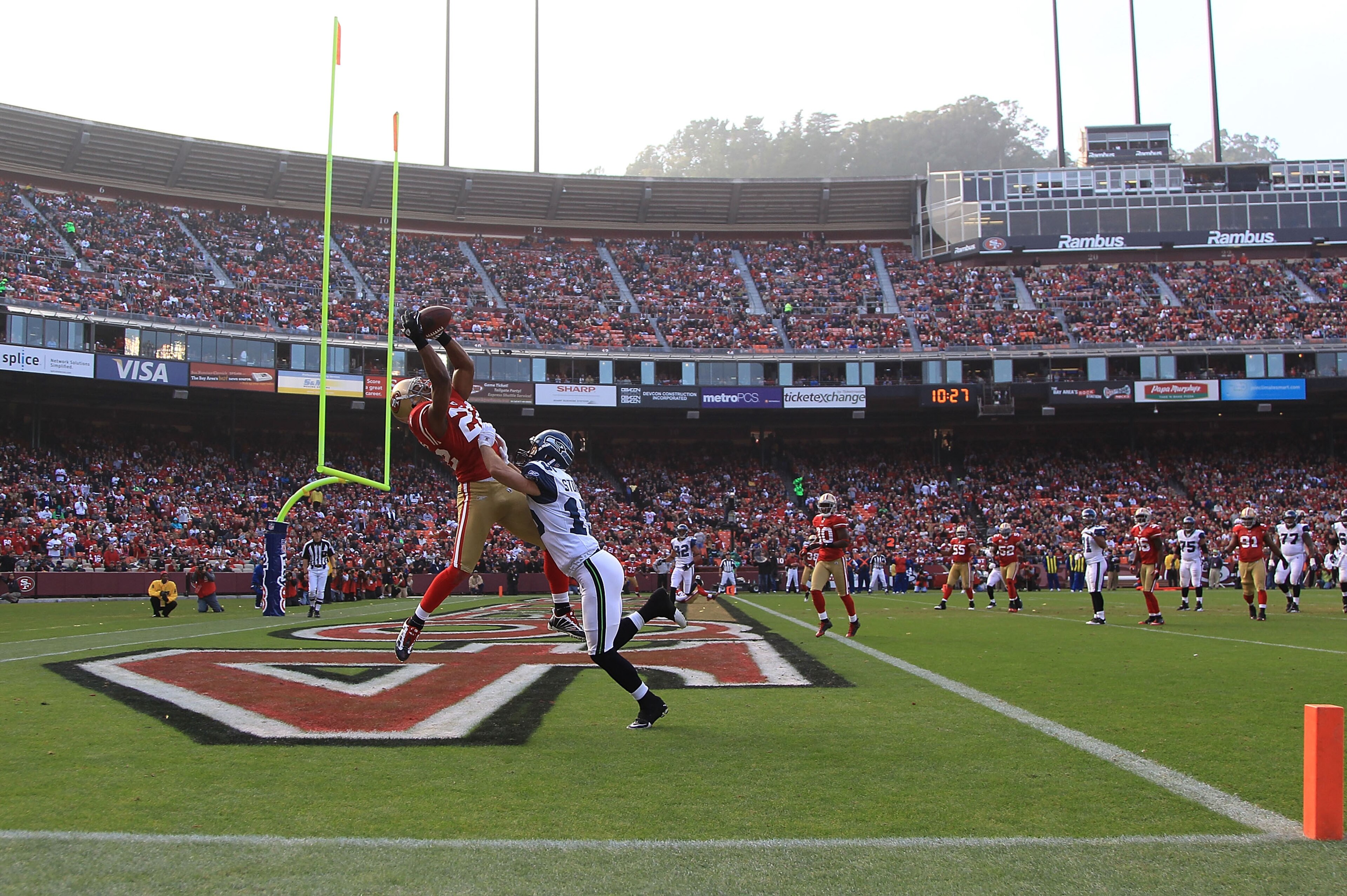 SAN FRANCISCO - DECEMBER 12:    Nate Clements #22 of the San Francisco 49ers intercepts a ball in the endzone against the Seattle Seahawks during an NFL game at Candlestick Park on December 12, 2010 in San Francisco, California.  (Photo by Jed Jacobsohn/G
