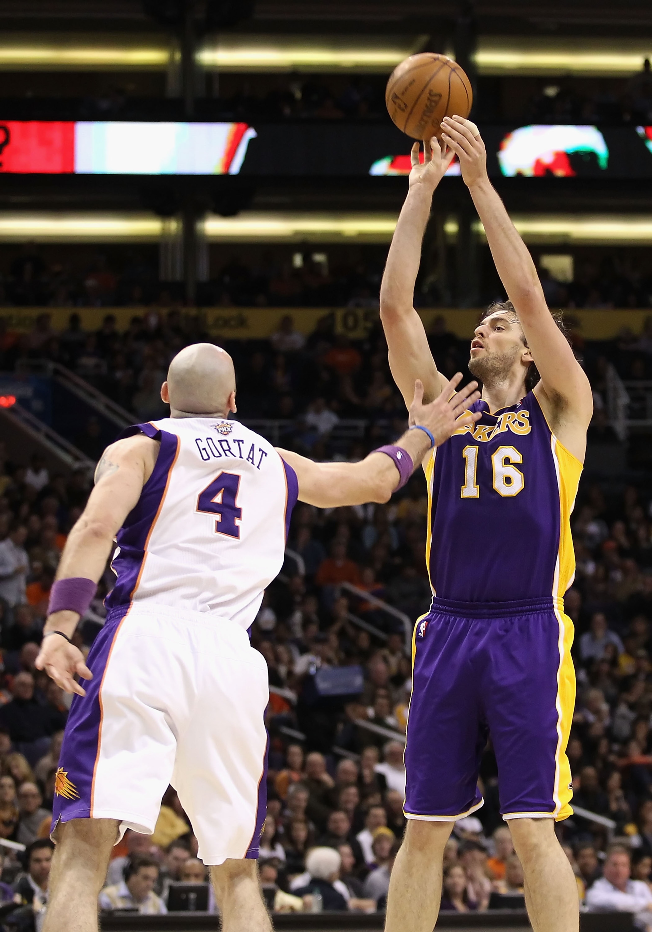 PHOENIX, AZ - JANUARY 05:  Pau Gasol #16 of the Los Angeles Lakers puts up a shot against the Phoenix Suns during the NBA game at US Airways Center on January 5, 2011 in Phoenix, Arizona. The Lakers defeated the Suns 99-95.  NOTE TO USER: User expressly a