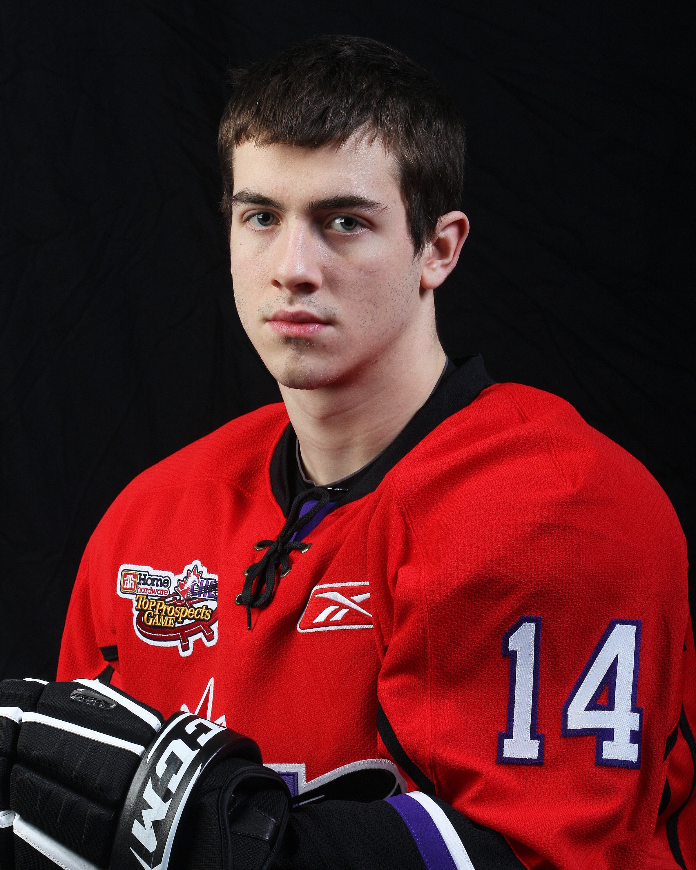 WINDSOR, ON - JANUARY 20:  Brad Ross #14 of Team Cherry poses for a portrait prior to the 2010 Home Hardware CHL/NHL Top Prospects game on January 20, 2010 at the WFCU Centre in Windsor, Ontario. Ross plays for the Portland Winterhawks (WHL). (Photo by Cl
