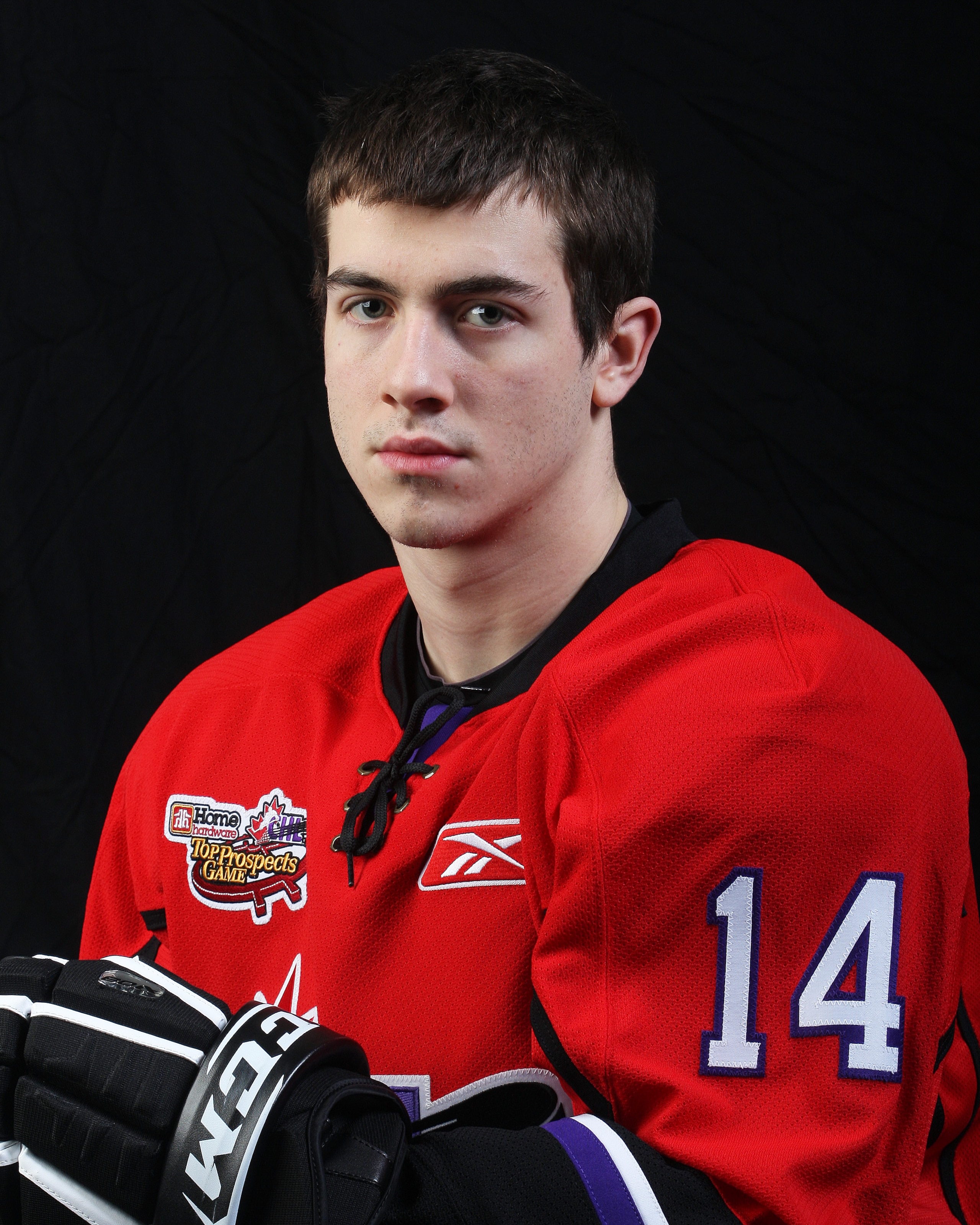 WINDSOR, ON - JANUARY 20:  Brad Ross #14 of Team Cherry poses for a portrait prior to the 2010 Home Hardware CHL/NHL Top Prospects game on January 20, 2010 at the WFCU Centre in Windsor, Ontario. Ross plays for the Portland Winterhawks (WHL). (Photo by Cl
