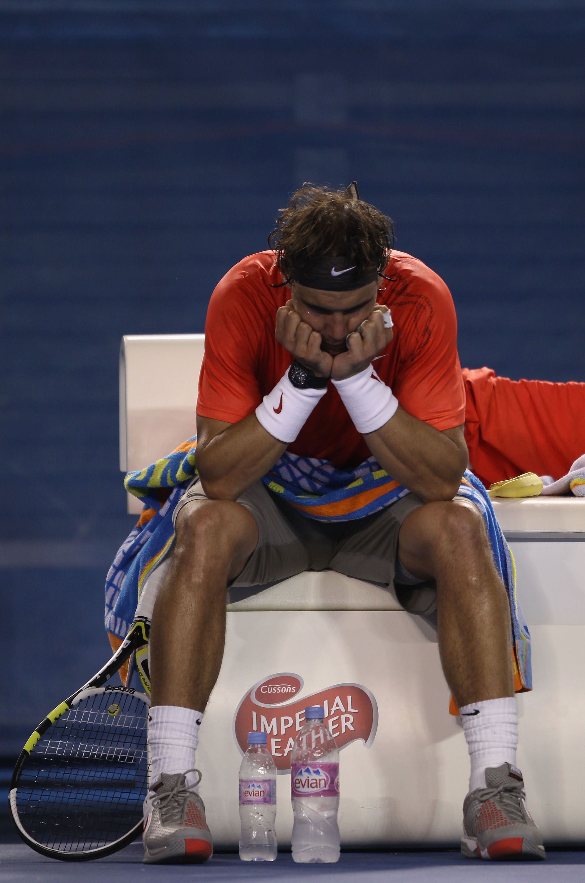 MELBOURNE, AUSTRALIA - JANUARY 26:  Rafael Nadal of Spain shows his emotions betweein games in his quarterfinal match against David Ferrer of Spain during day ten of the 2011 Australian Open at Melbourne Park on January 26, 2011 in Melbourne, Australia.